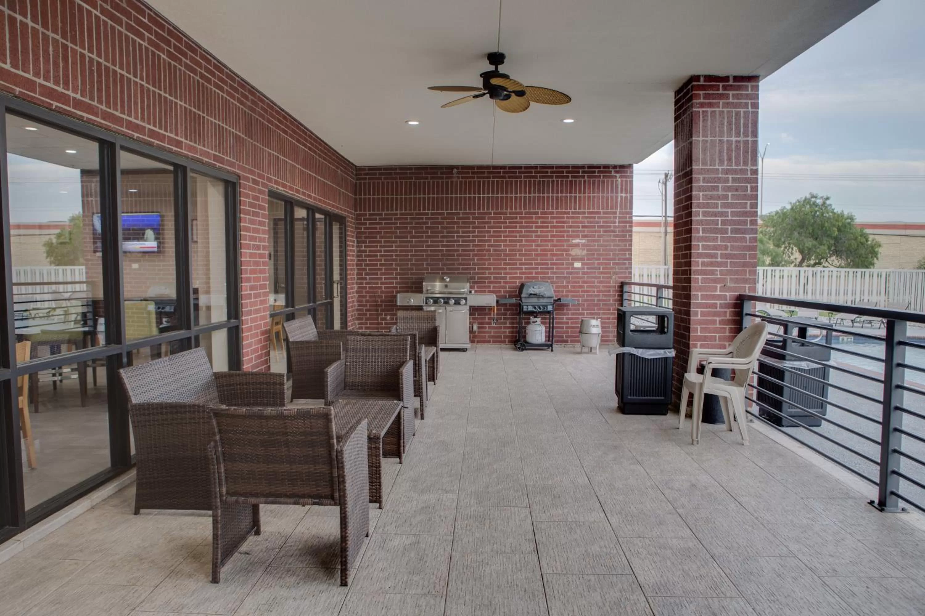 Patio in Country Inn & Suites by Radisson, Harlingen, TX