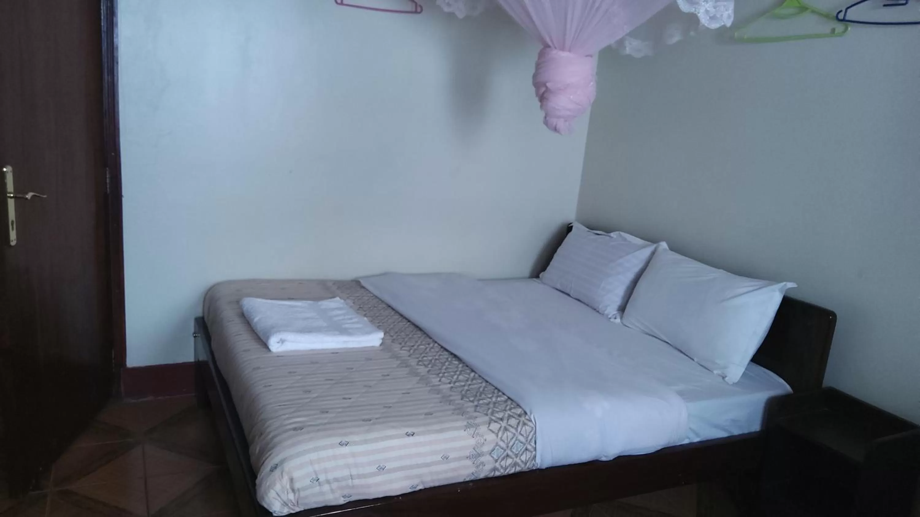 Bed in Lucia Villas Mbale