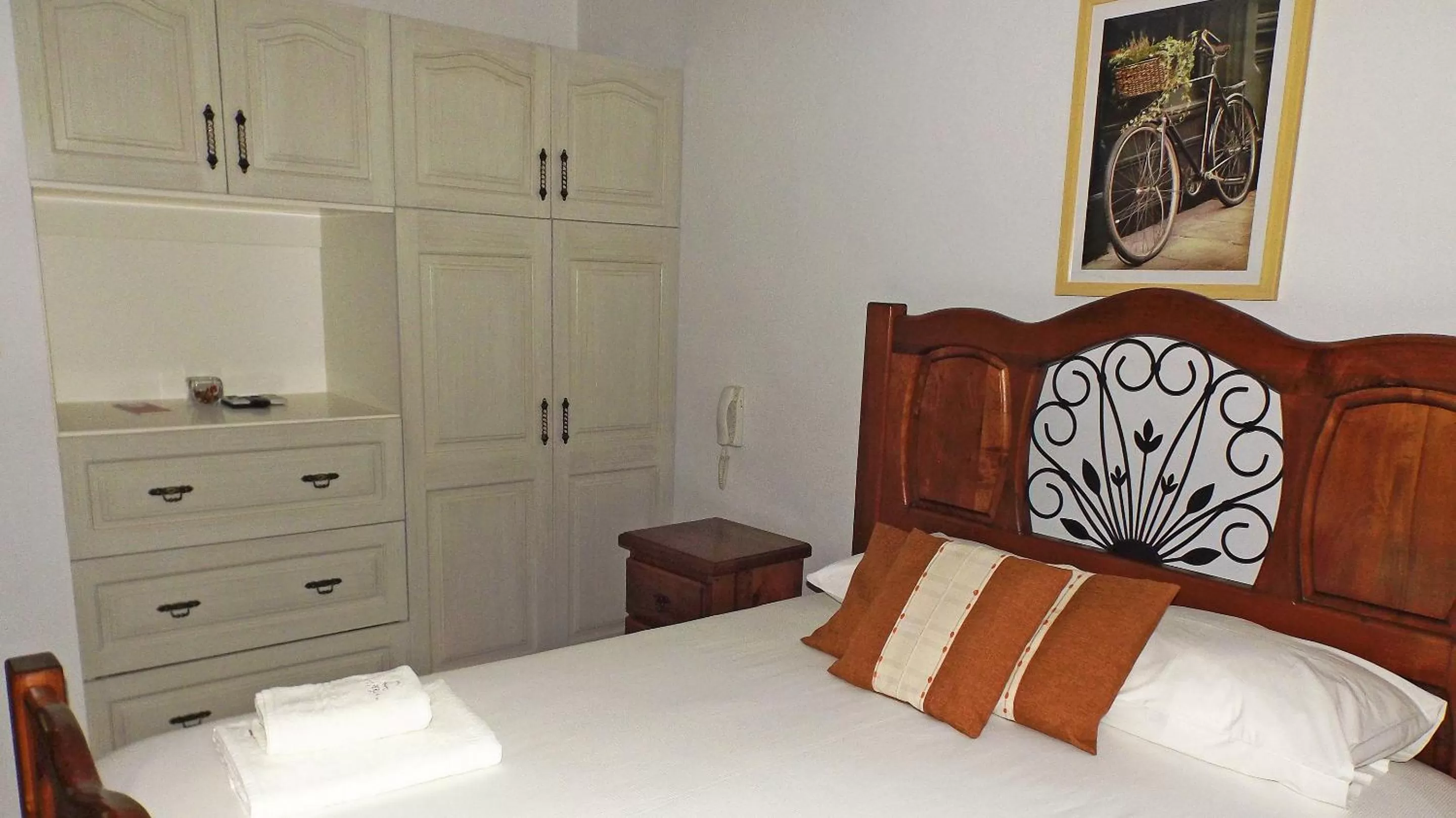 Bed in La Perla Hotel