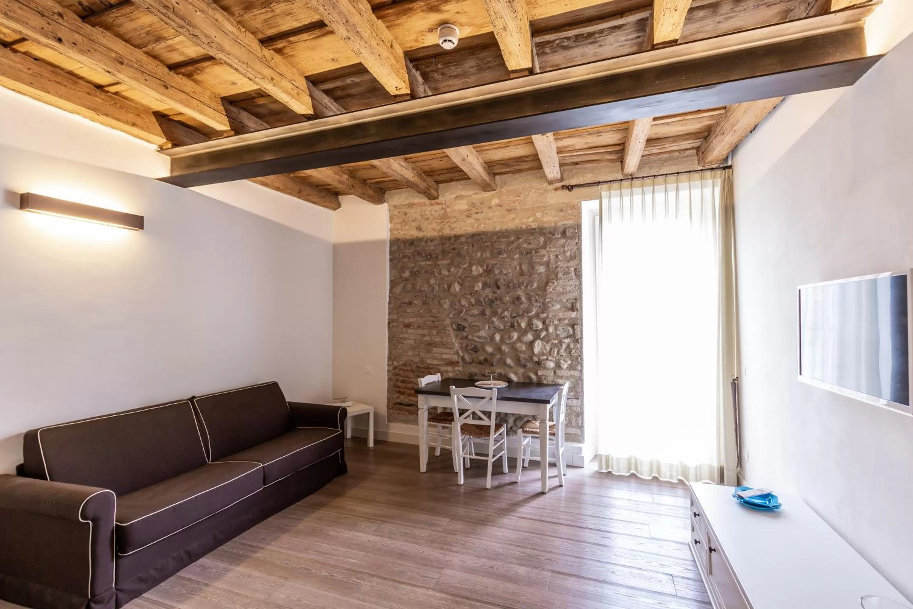 Living room in Residence Corte San Carlo