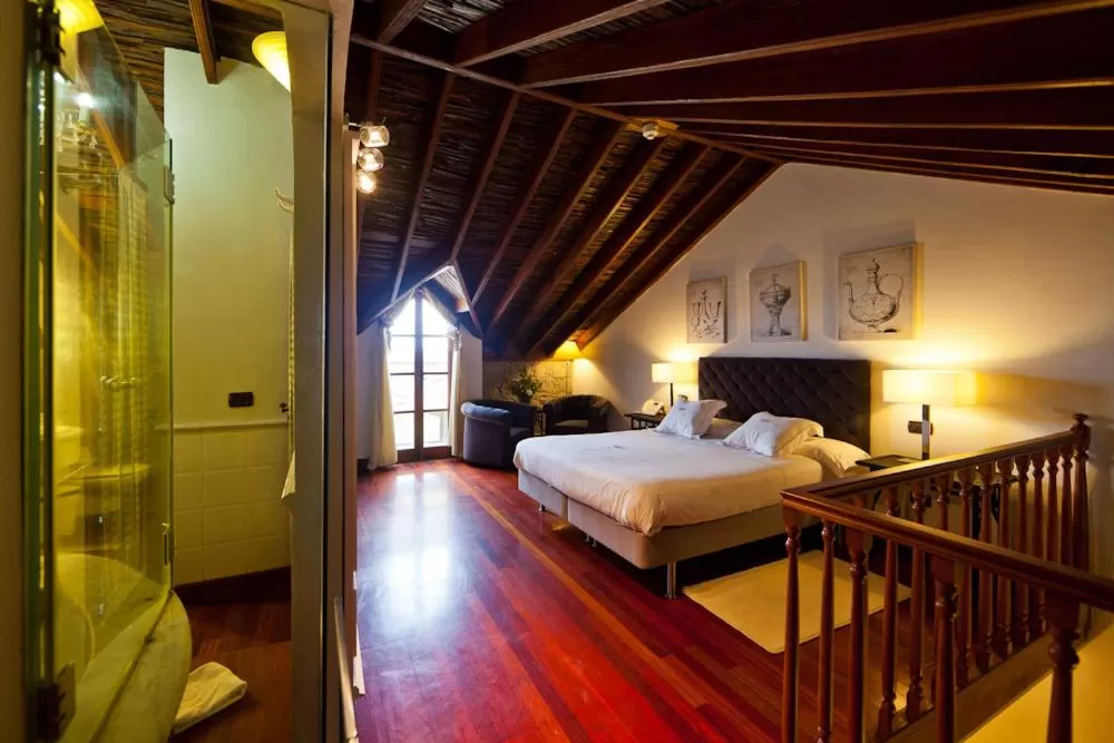 Bed in Hotel Rural Hacienda del Buen Suceso