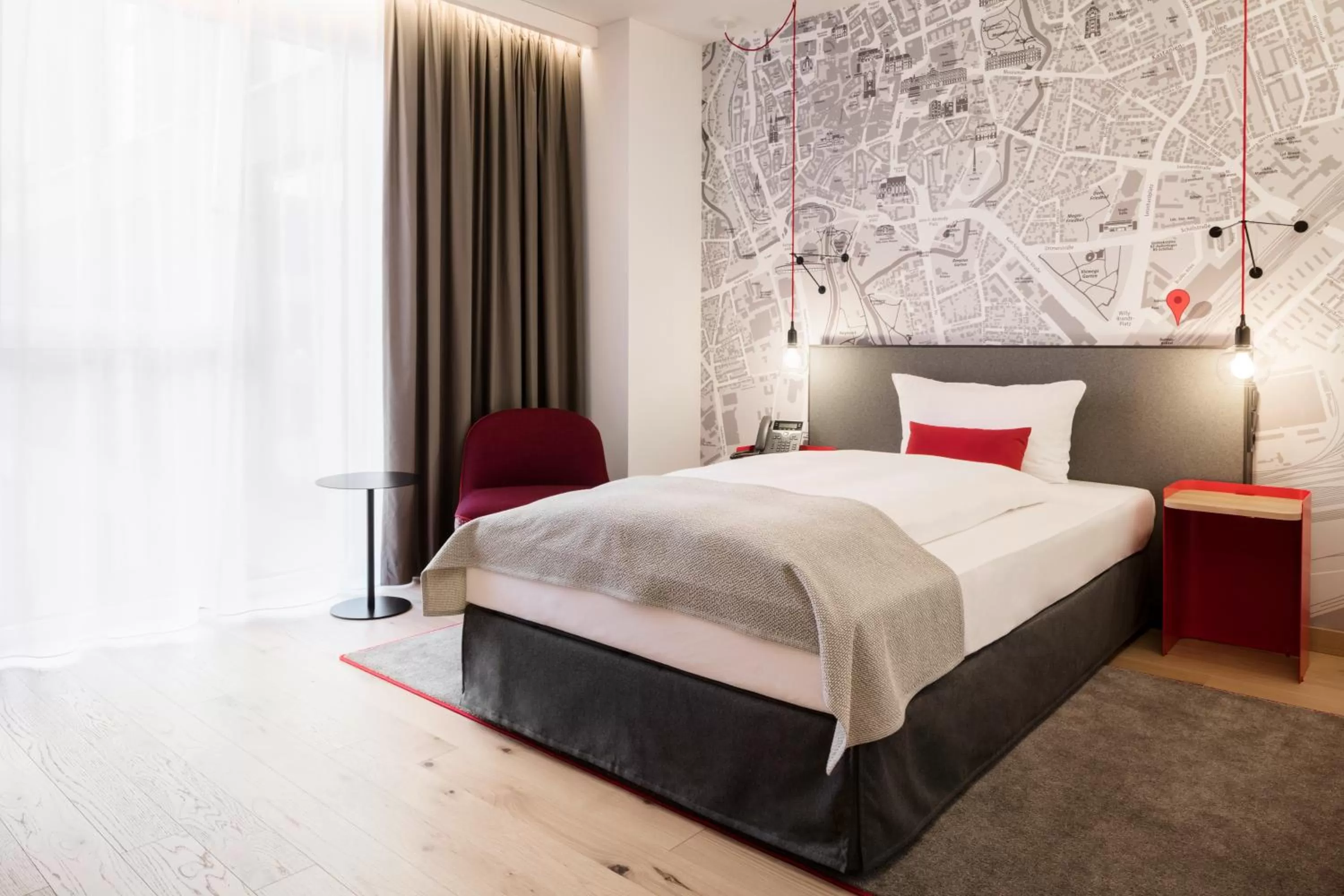 Photo of the whole room, Bed in IntercityHotel Braunschweig