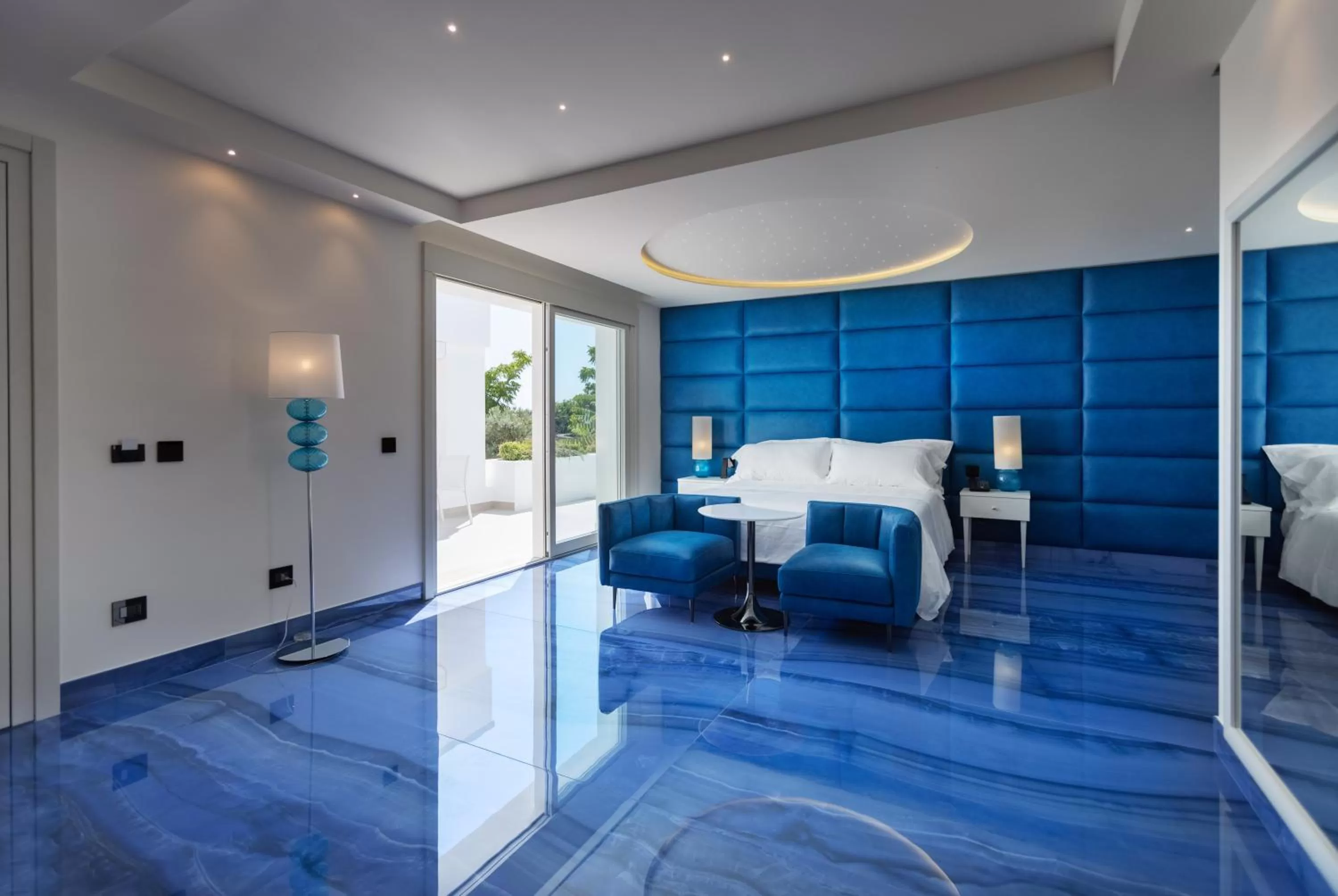 Bedroom in Grotta Palazzese Beach Hotel