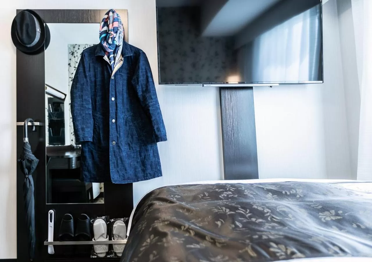 Photo of the whole room, Bed in APA Hotel Kagoshima Tenmonkan