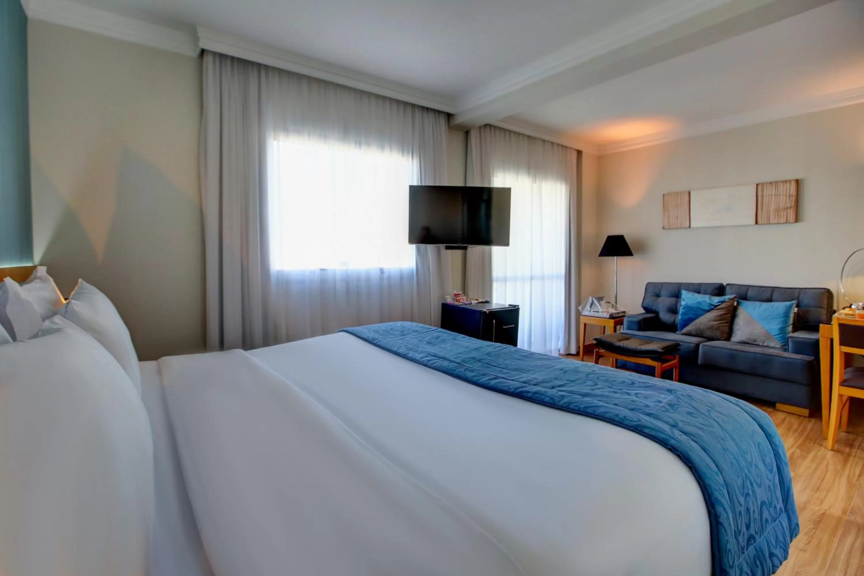 Photo of the whole room, Bed in Quality Suítes Oscar Freire