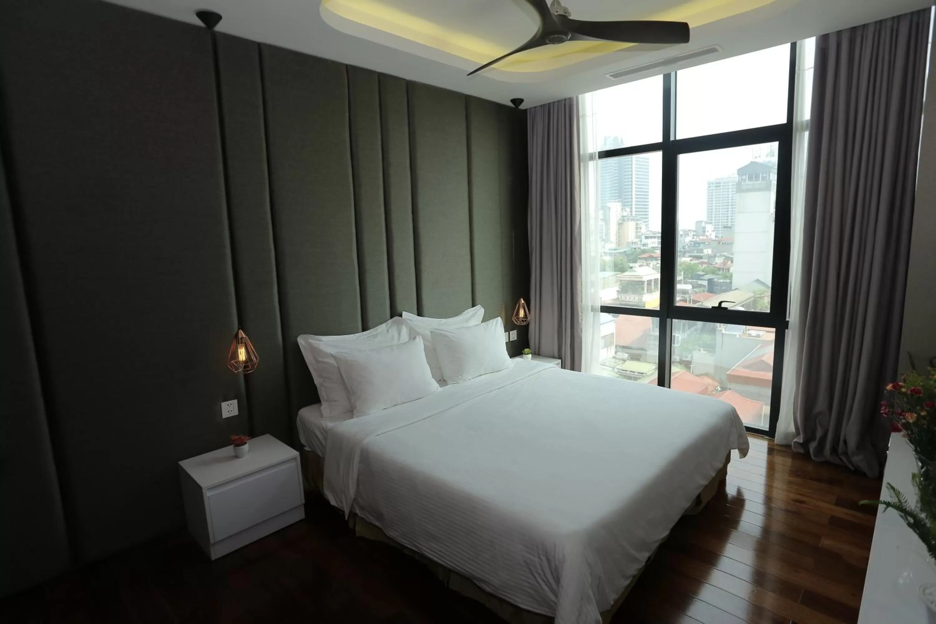 Bed in HNC Premier Hotel & Residences