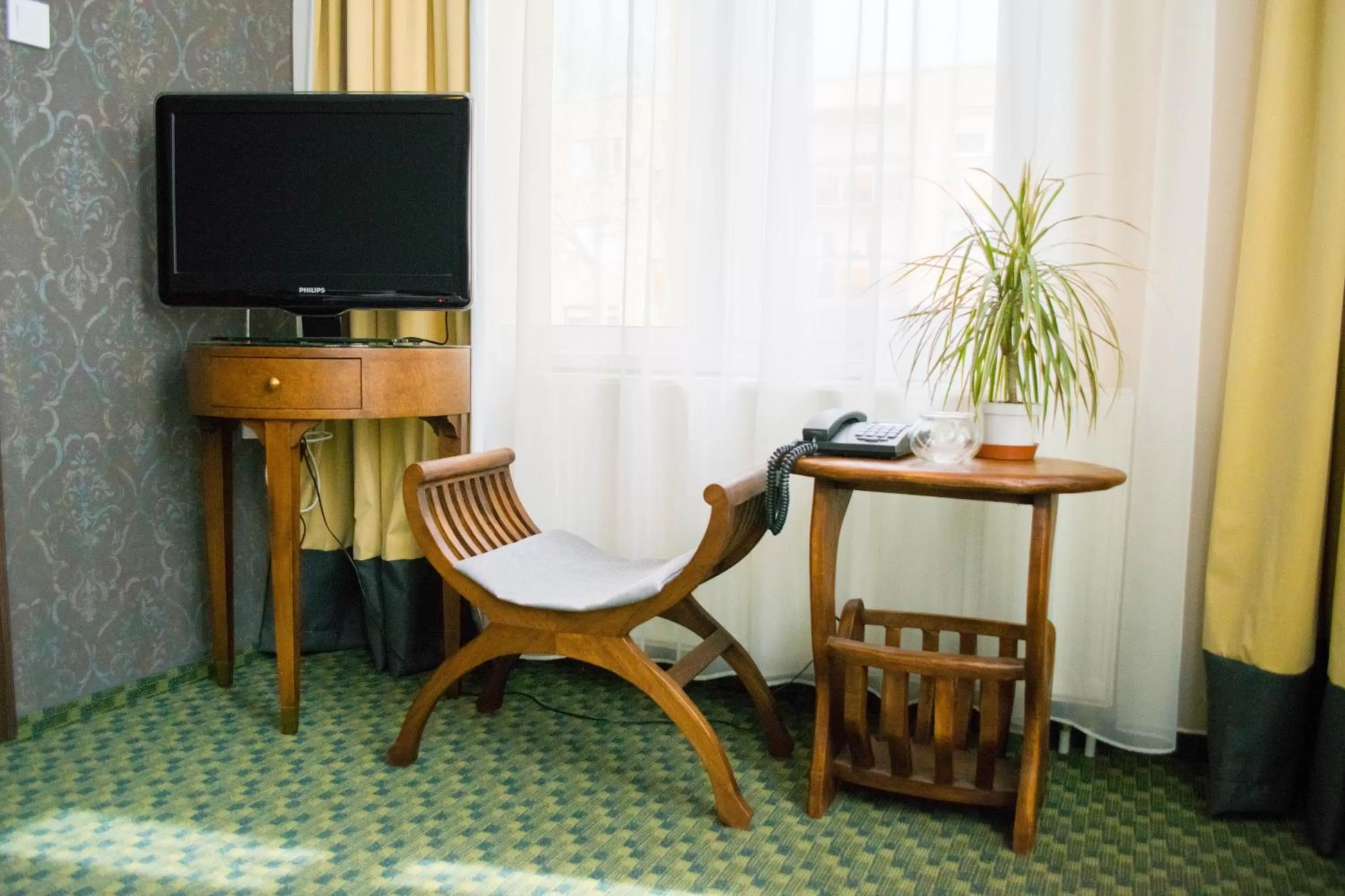 TV and multimedia, TV/Entertainment Center in Petra Hotel