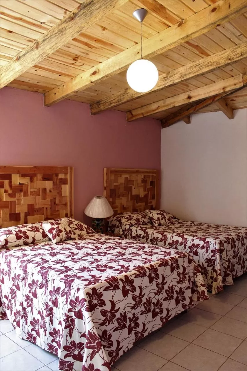 Bedroom, Bed in Villas La Quinta