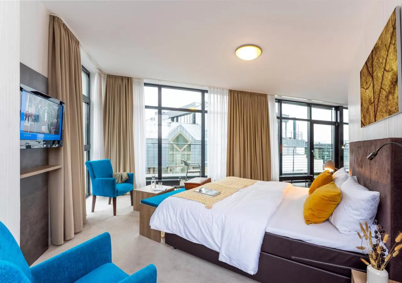 Bed in KONCEPT HOTEL Benedikt