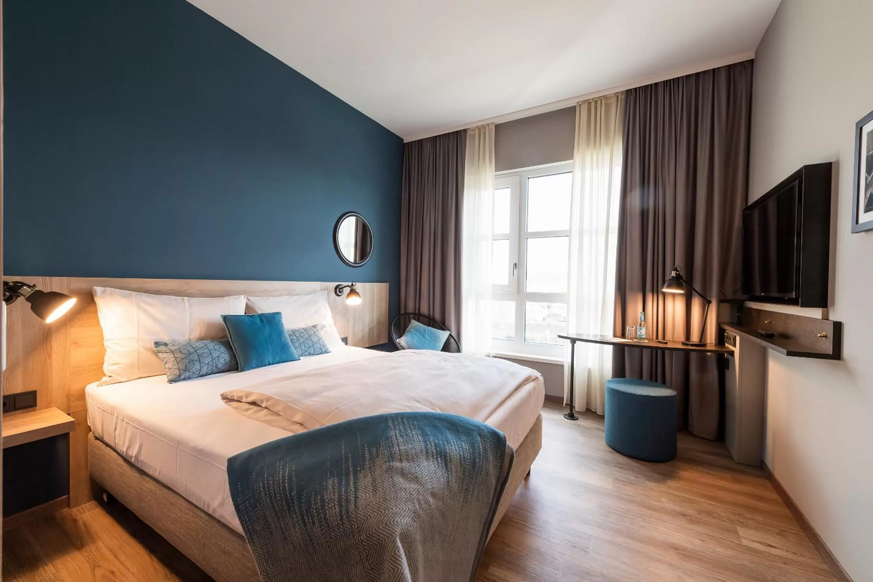 Photo of the whole room, Bed in HARBR Hotel Heilbronn, a member of Radisson Individuals