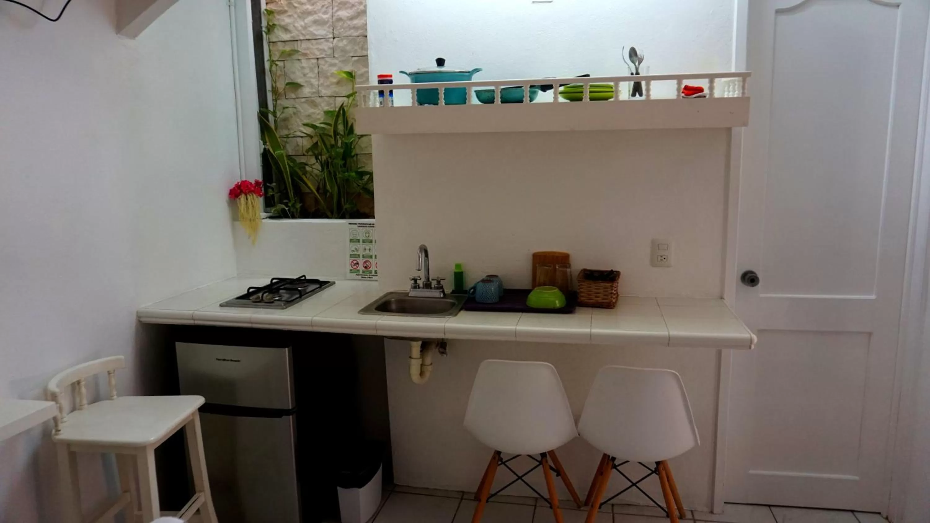 Kitchen or kitchenette in Selva y Mar Apart Hotel