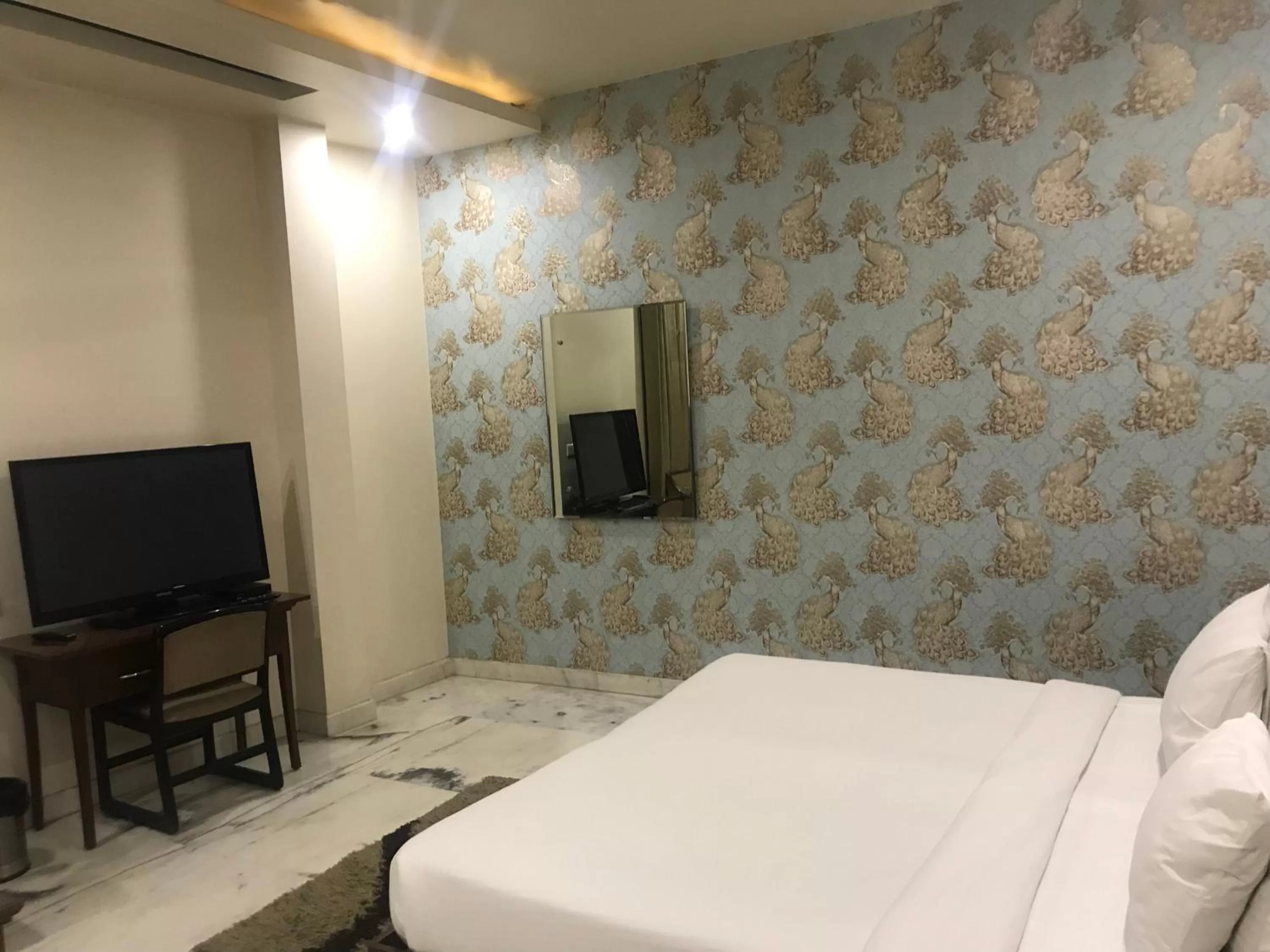 Bed in Hotel Leela Grande