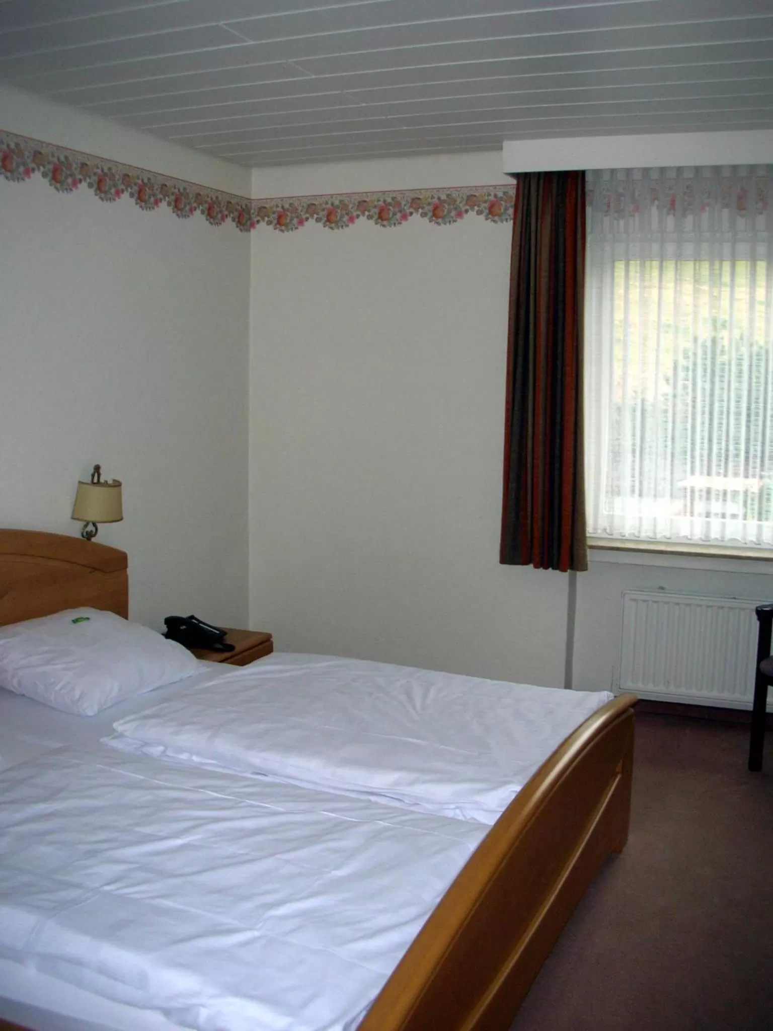 Bed in Heidehotel Hildfeld