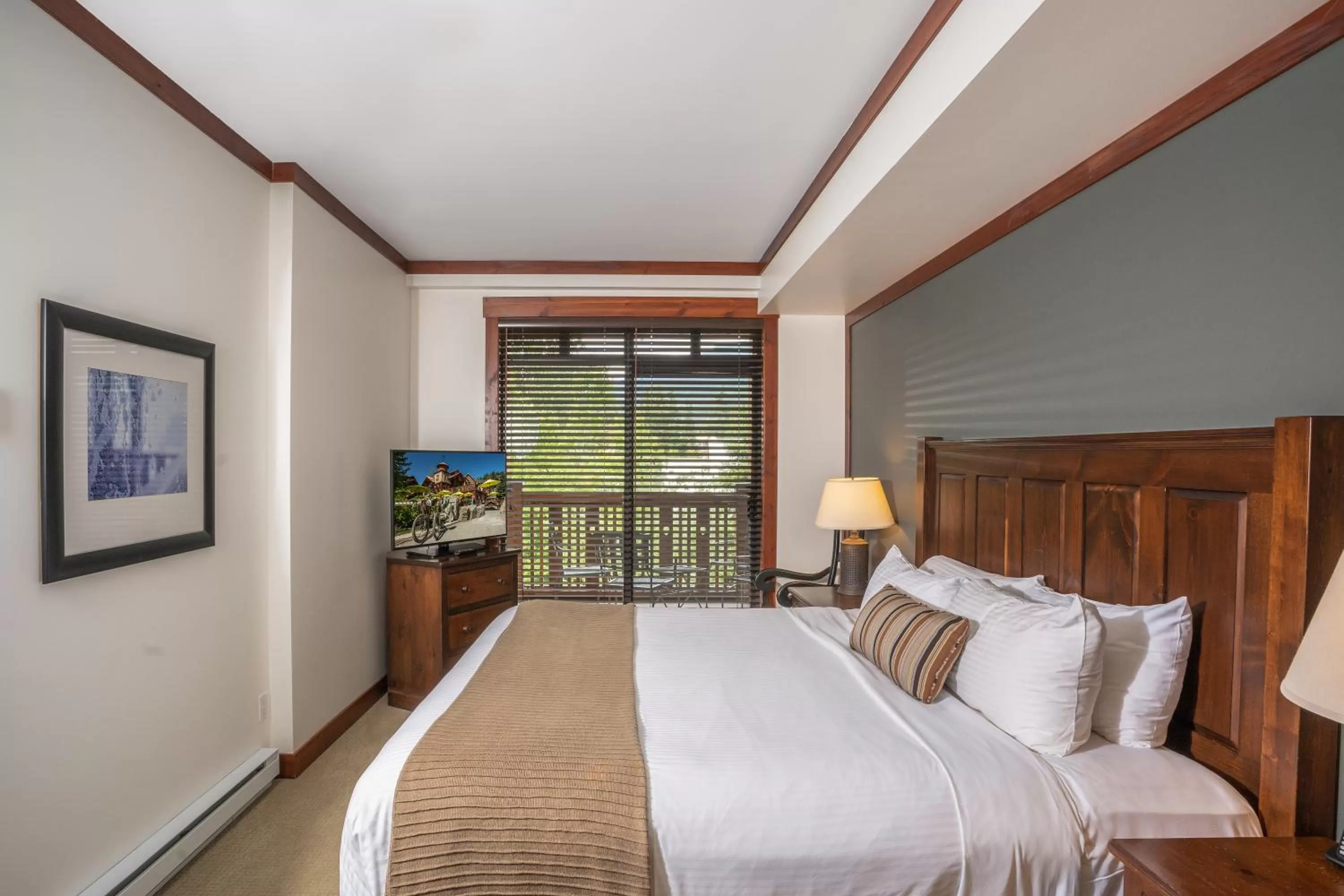 Bed in First Tracks Lodge, by Lodging Ovations