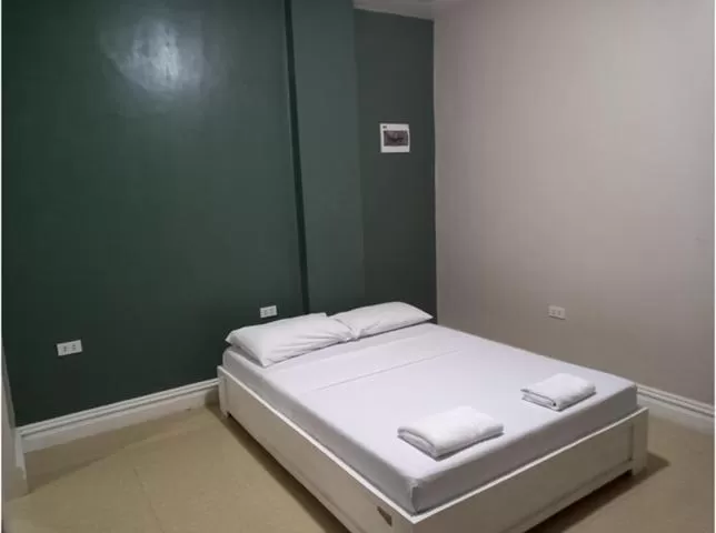 Bed in Sandscape Hotel