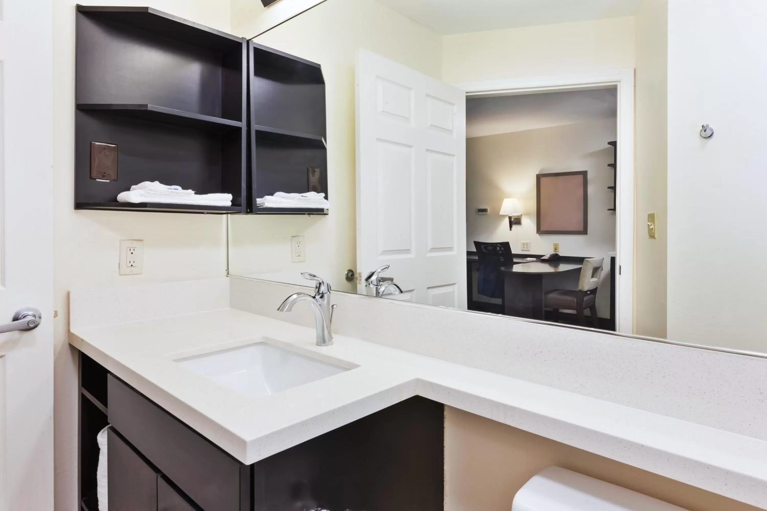 Bathroom in Candlewood Suites Huntersville-Lake Norman Area by IHG