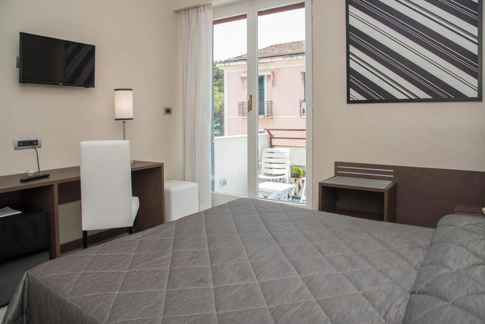 Bed in Reginna Palace Hotel