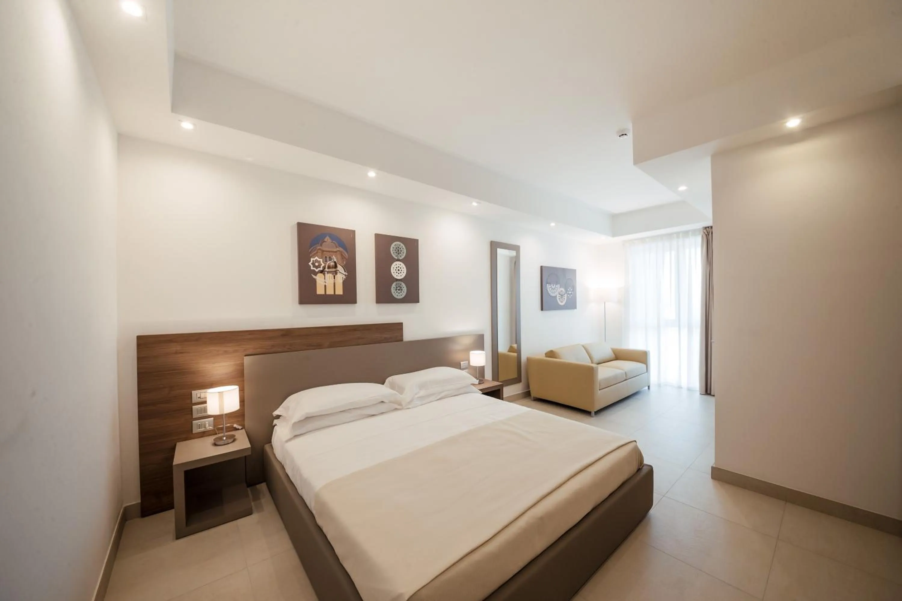 Bed in Grieco Business & Spa Hotel