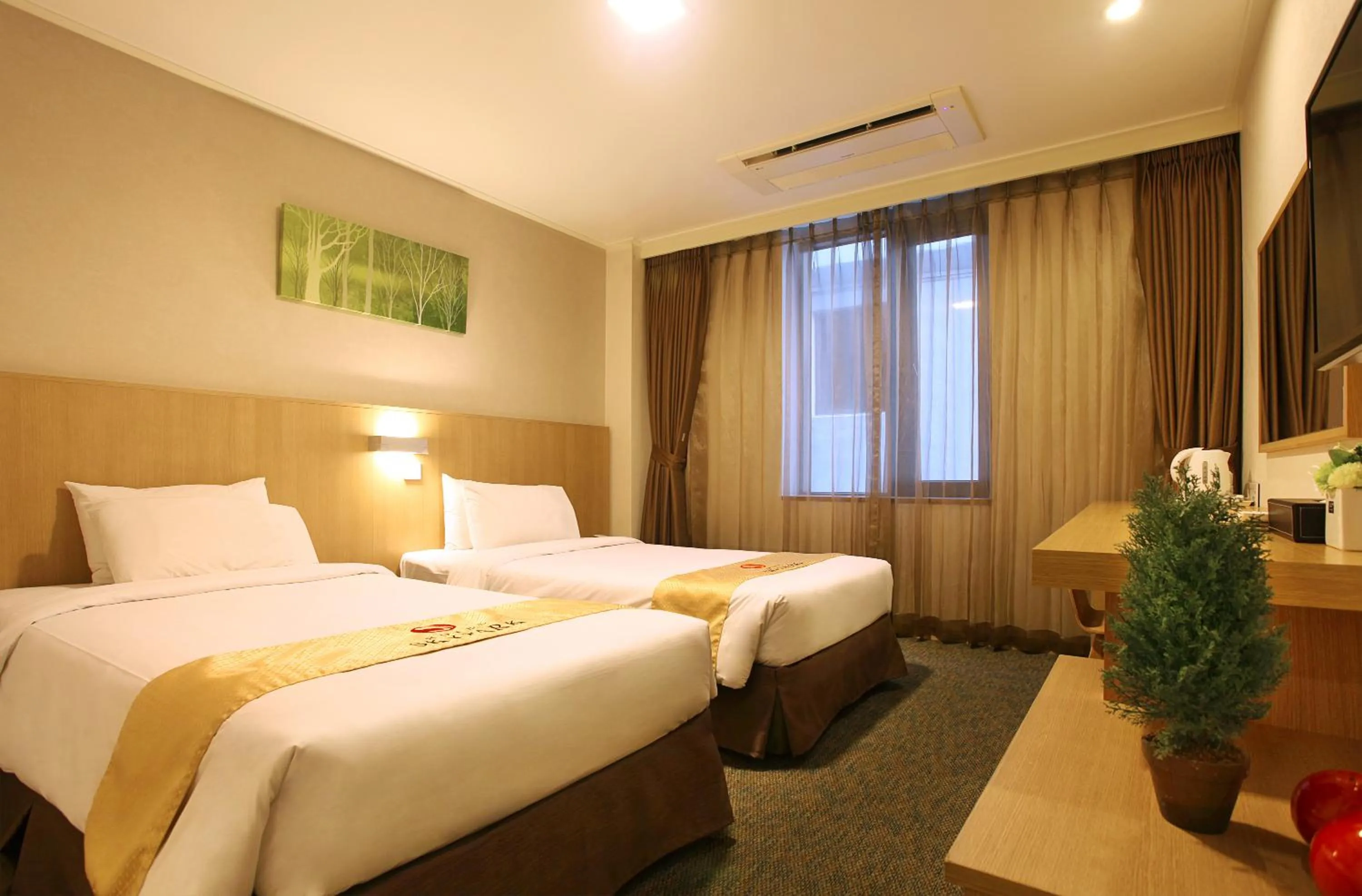 Bedroom, Bed in Hotel Skypark Jeju 1 Newly renovated