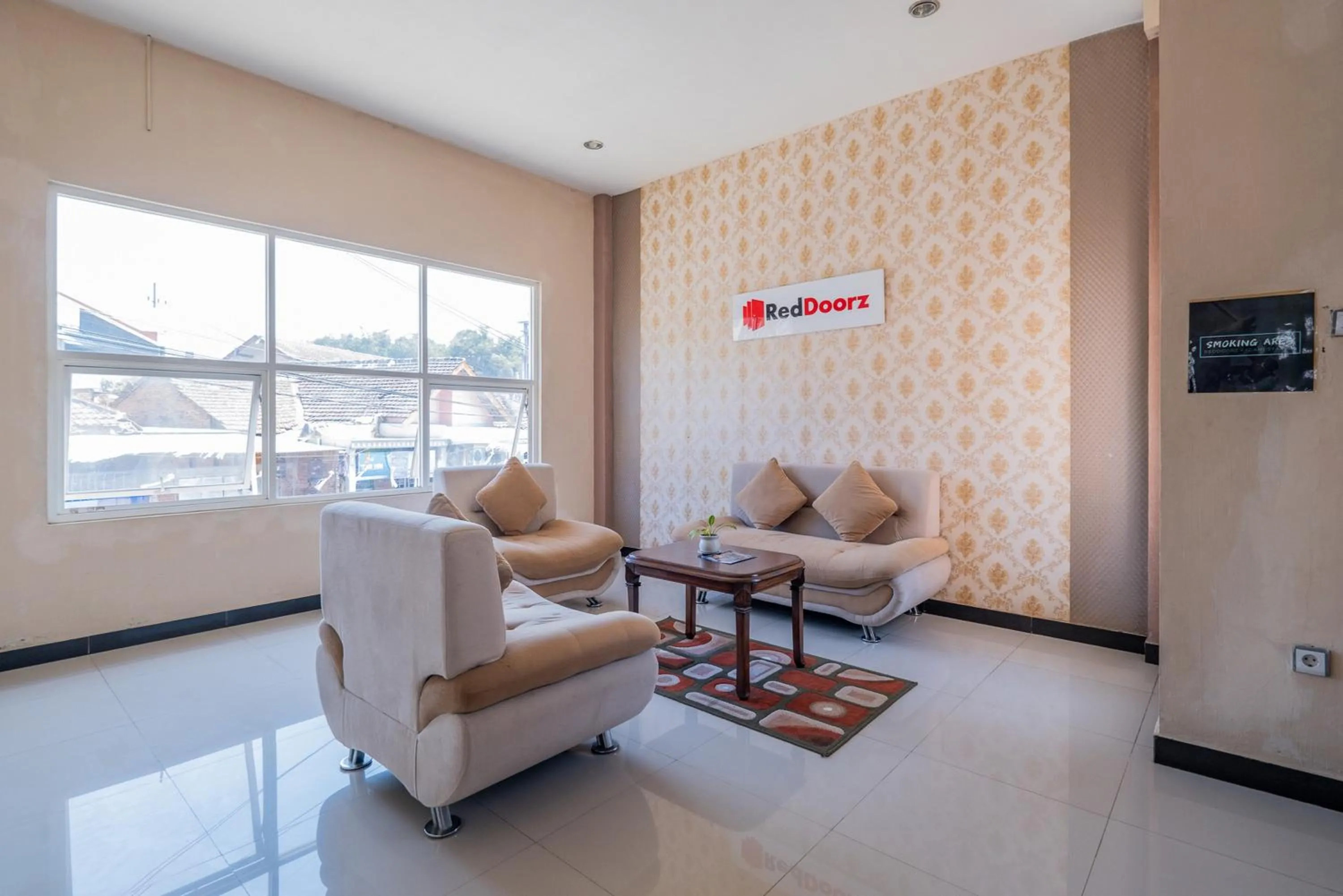 Seating area in RedDoorz Syariah near Batu Night Spectacular