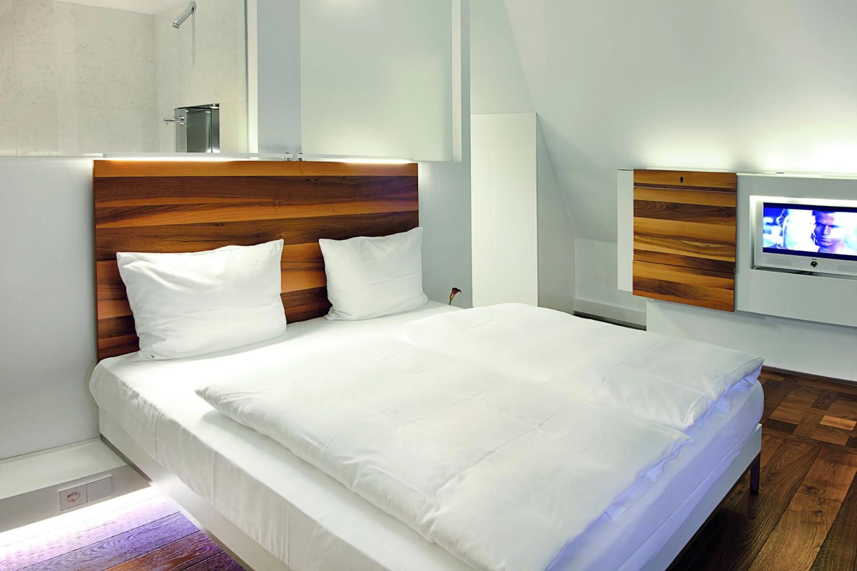 Bed in HOPPER Hotel St. Josef