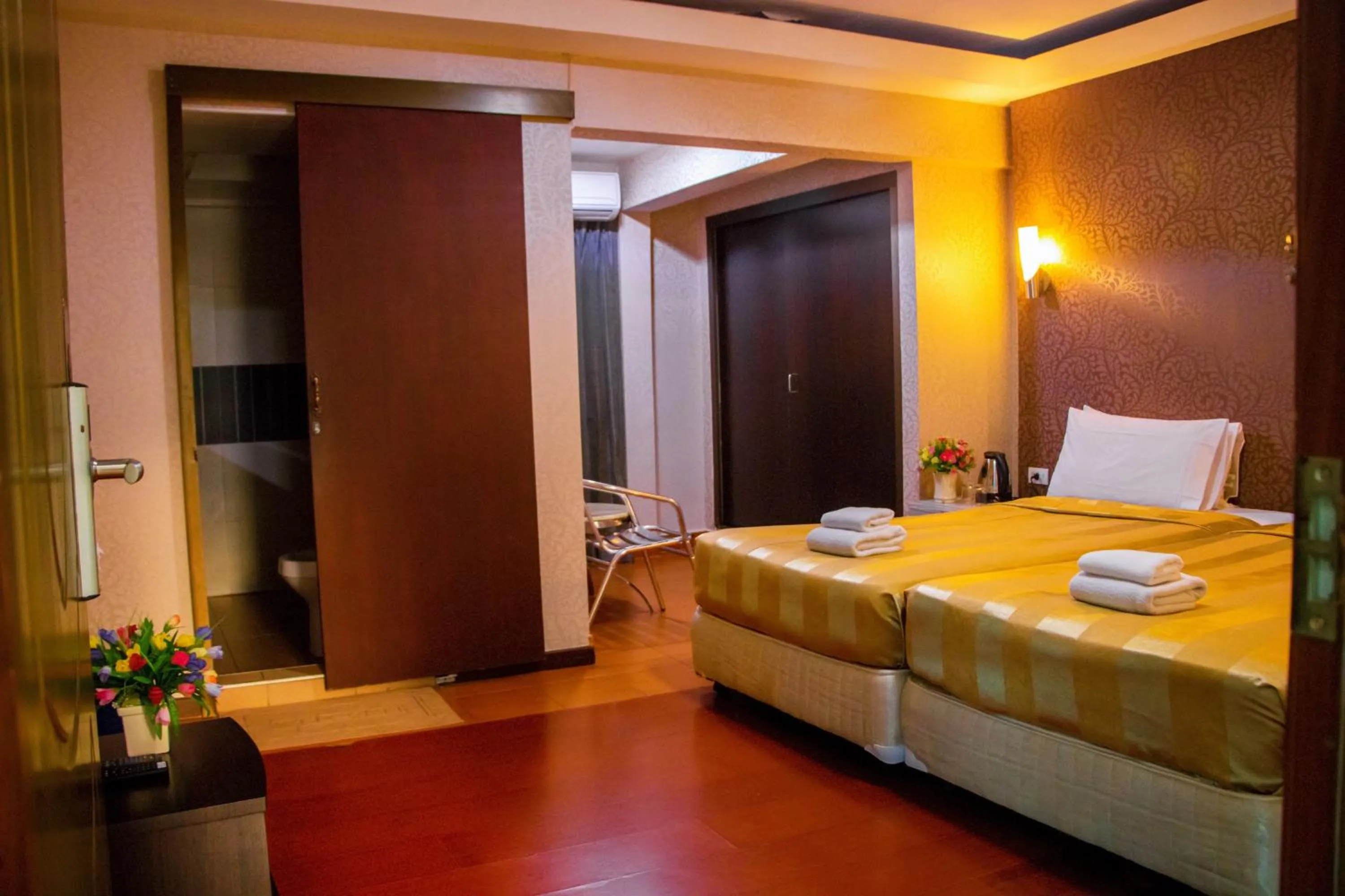 Bed in Visiting Card Hotel & Resort