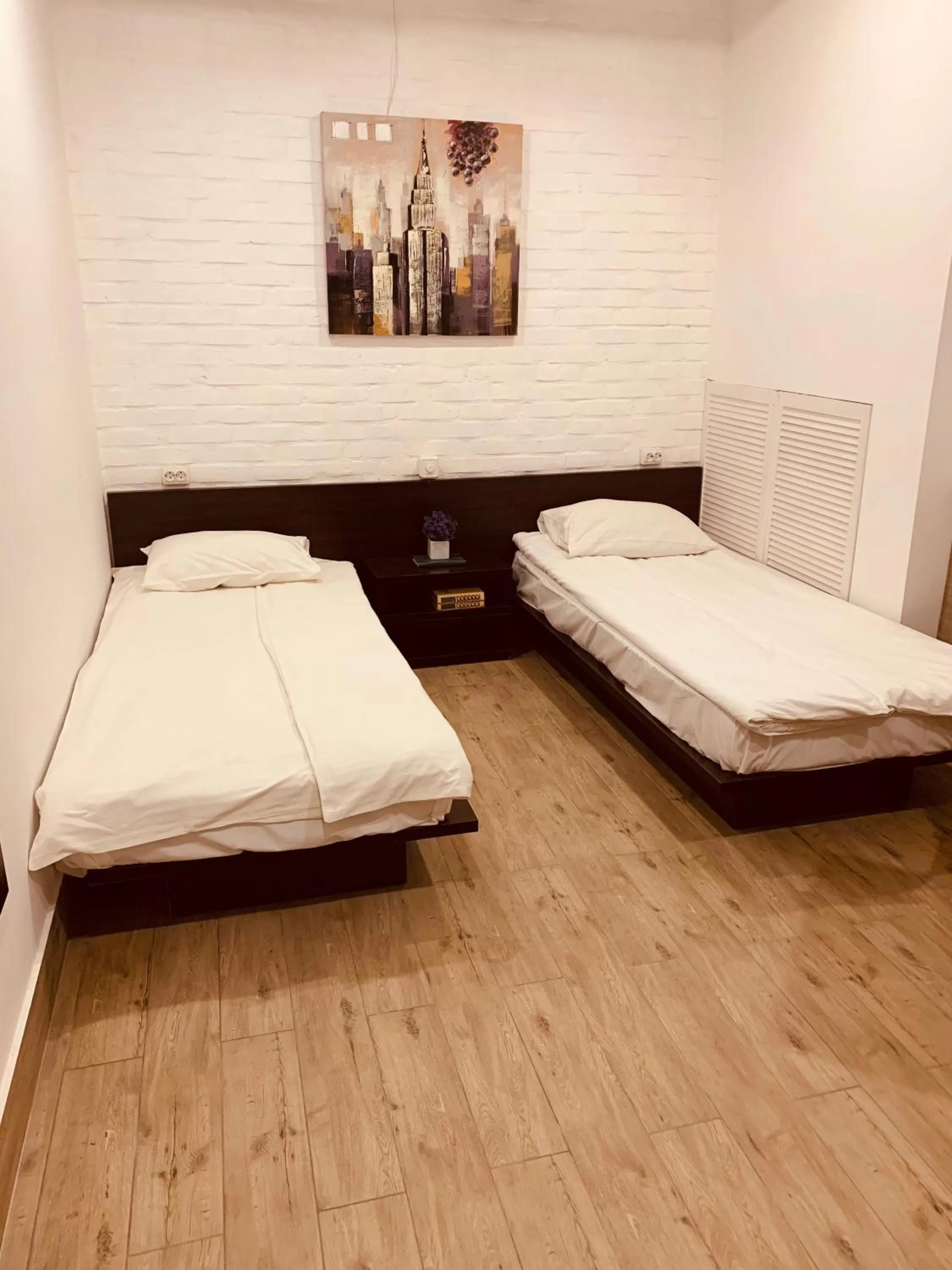 Bed in WINE & ROSE BOUTIQUE HOTEL