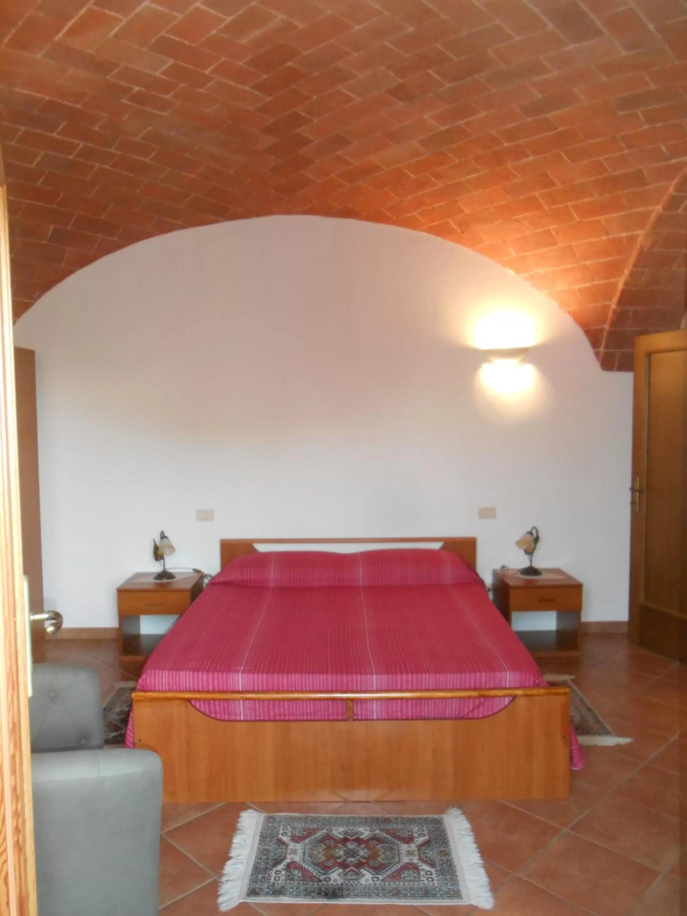 Photo of the whole room, Bed in Orto degli Ulivi