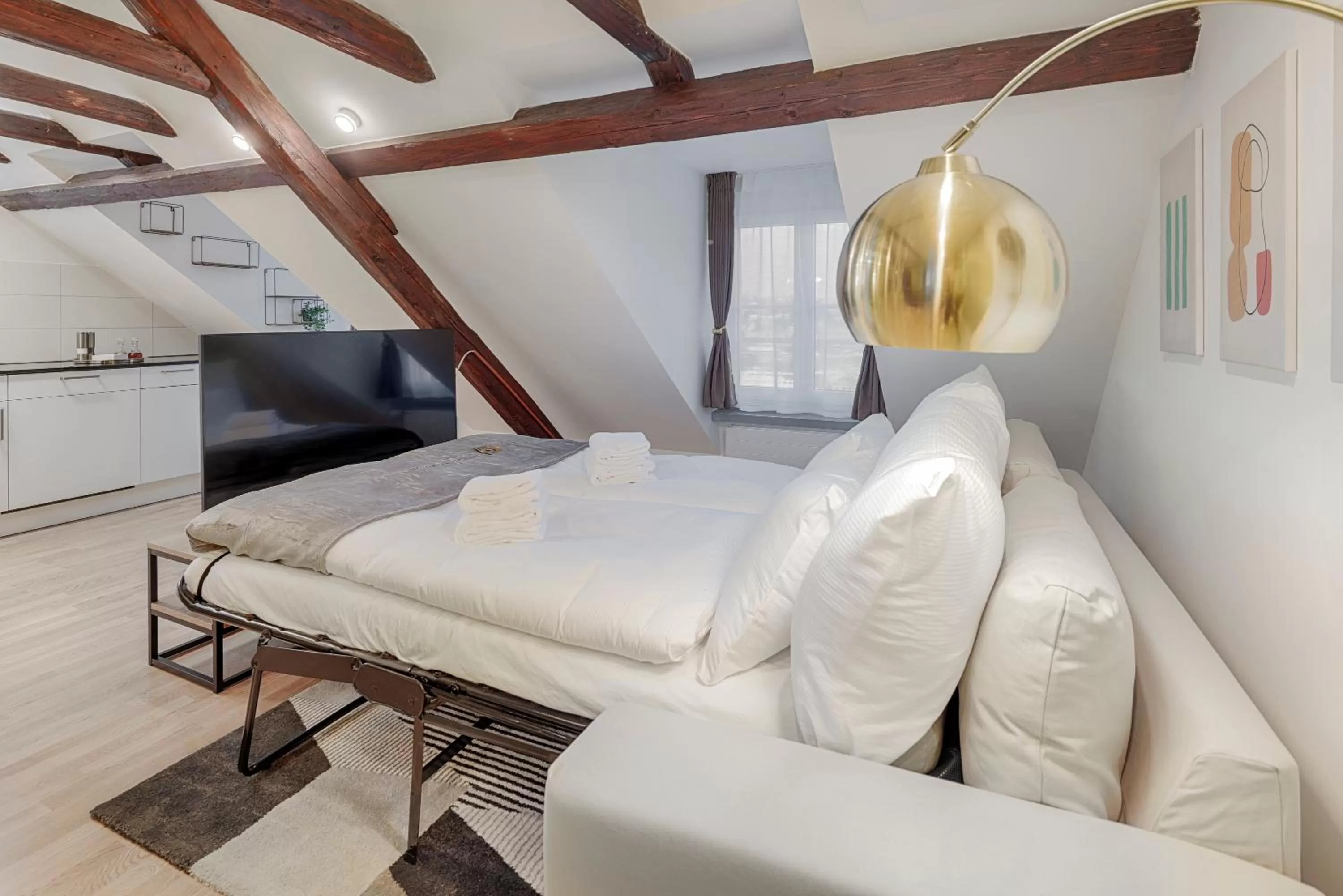 Bed in VISIMO Apartments St Georgen-Strasse St Gallen - Design City Nature