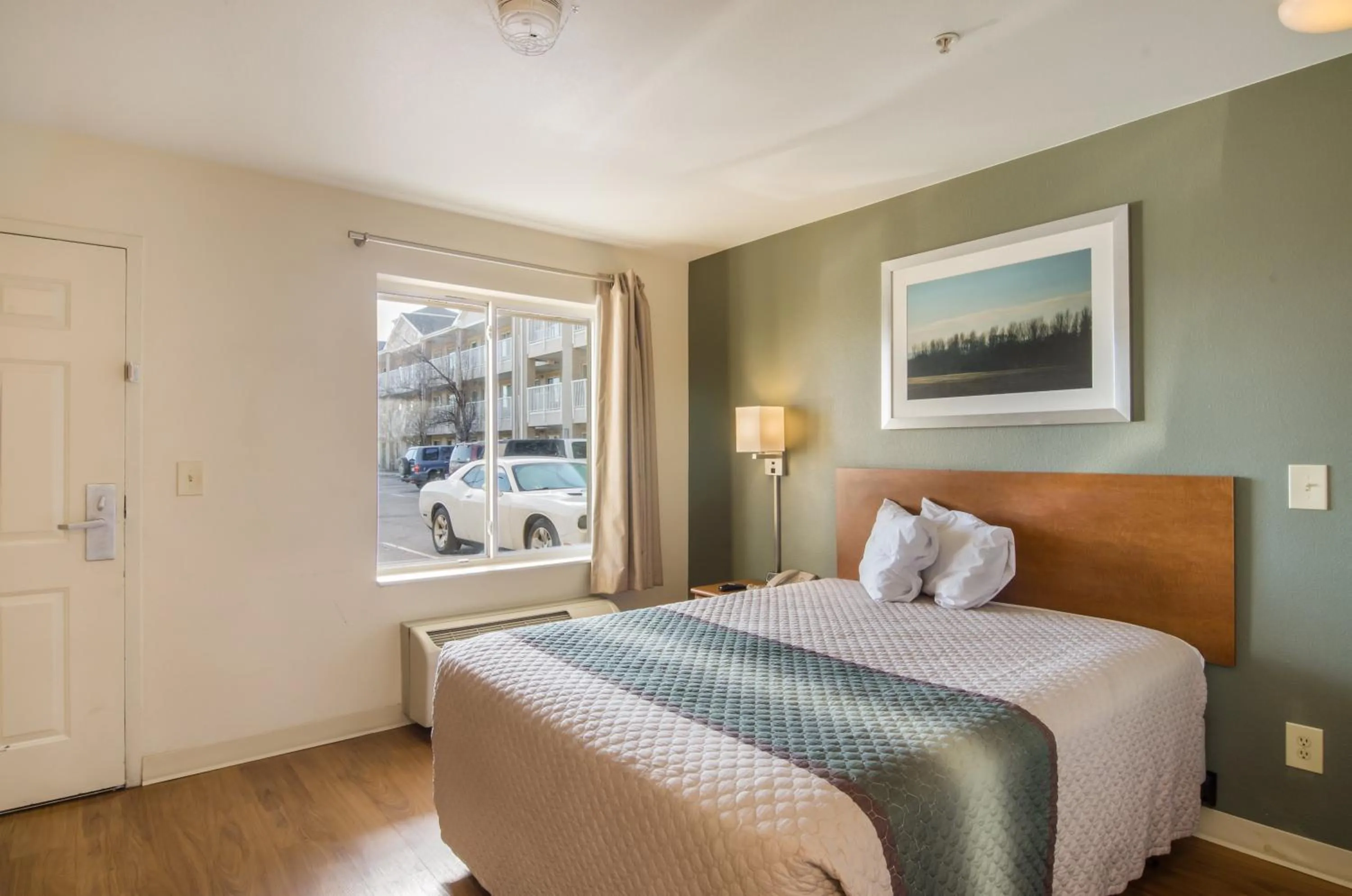 Photo of the whole room, Bed in HomeTowne Studios by Red Roof Denver - Airport/Aurora