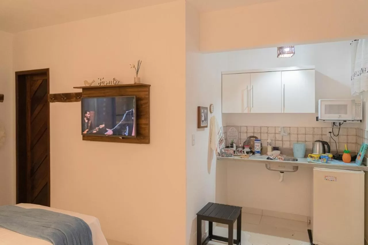 Kitchen or kitchenette, Bed in Pousada Recanto da Família