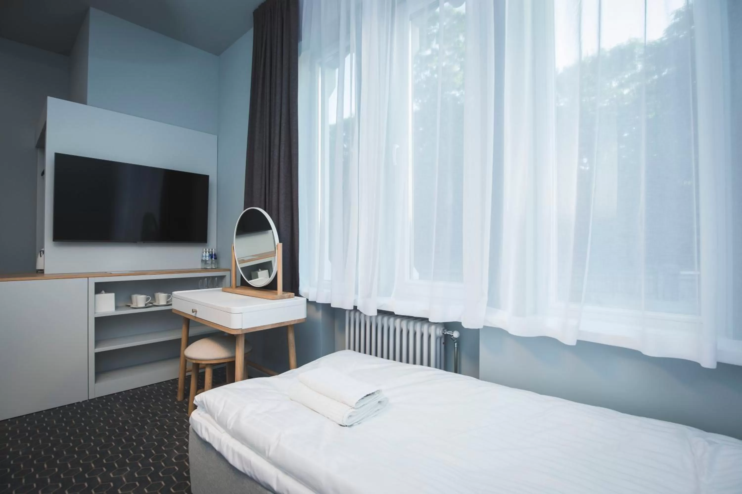TV and multimedia, Bed in Roze Park Rooms