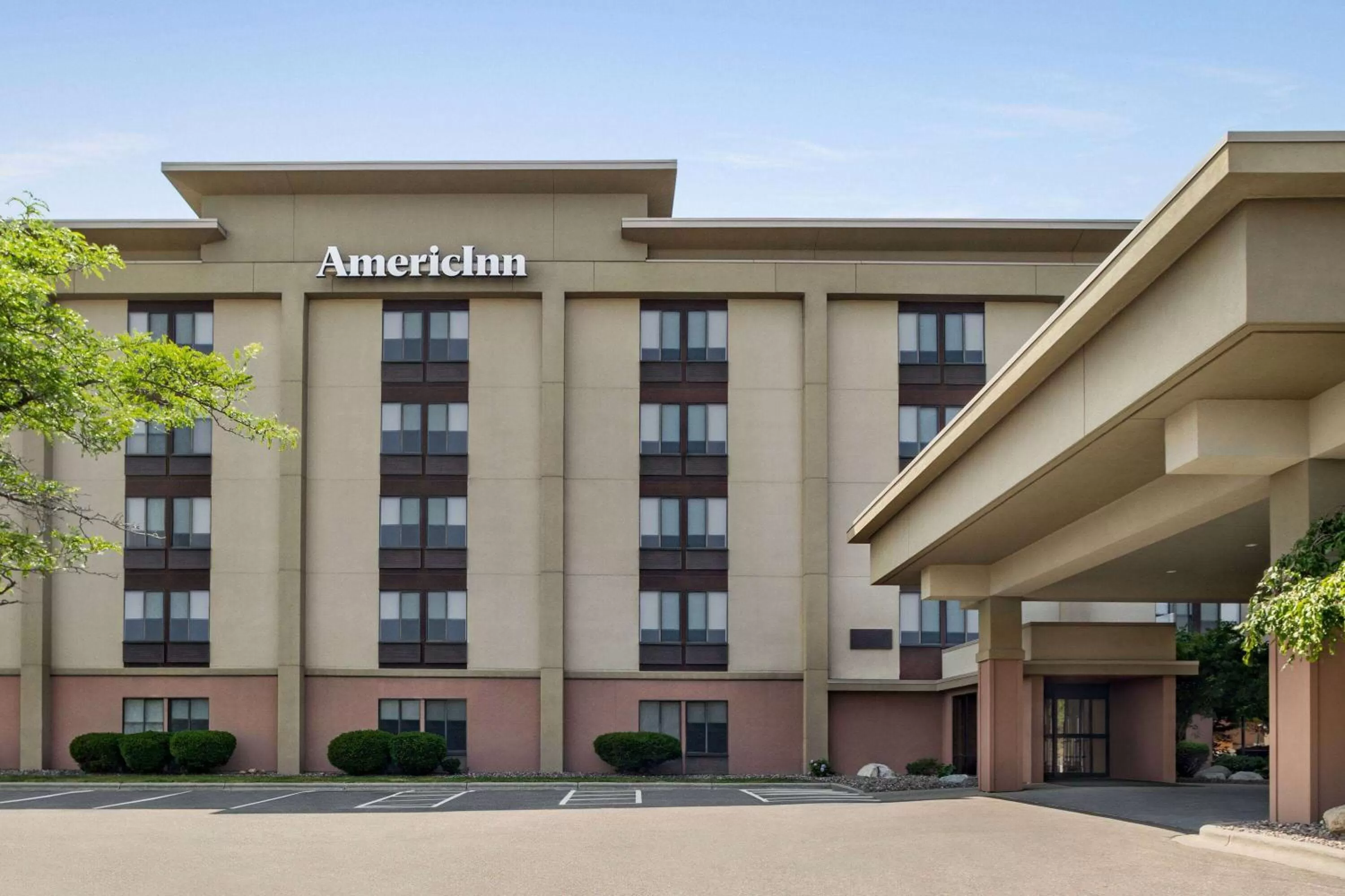 Property building in AmericInn by Wyndham Madison West