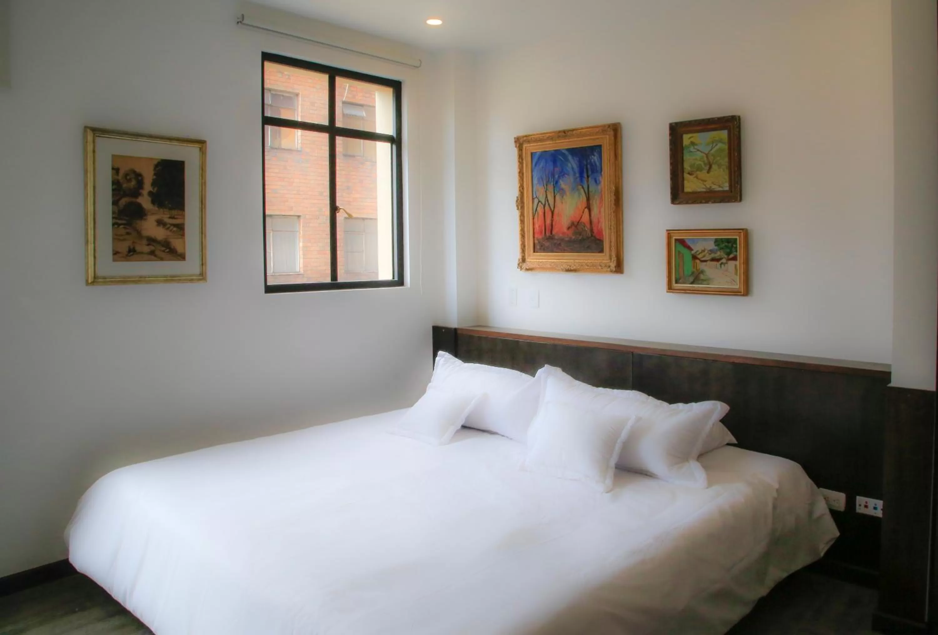 Bed in Hotel Museo San Moritz