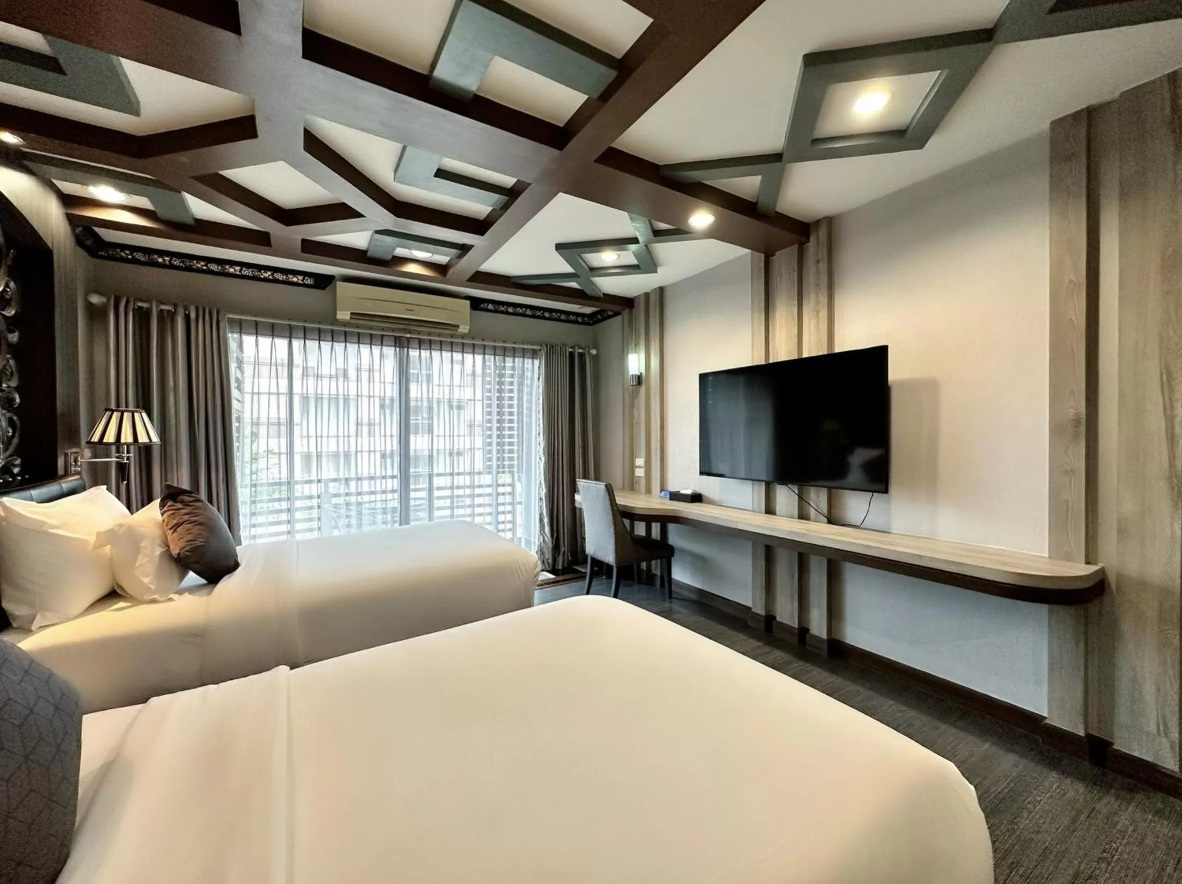 Communal lounge/ TV room, Bed in KTK Pattaya Hotel & Residence
