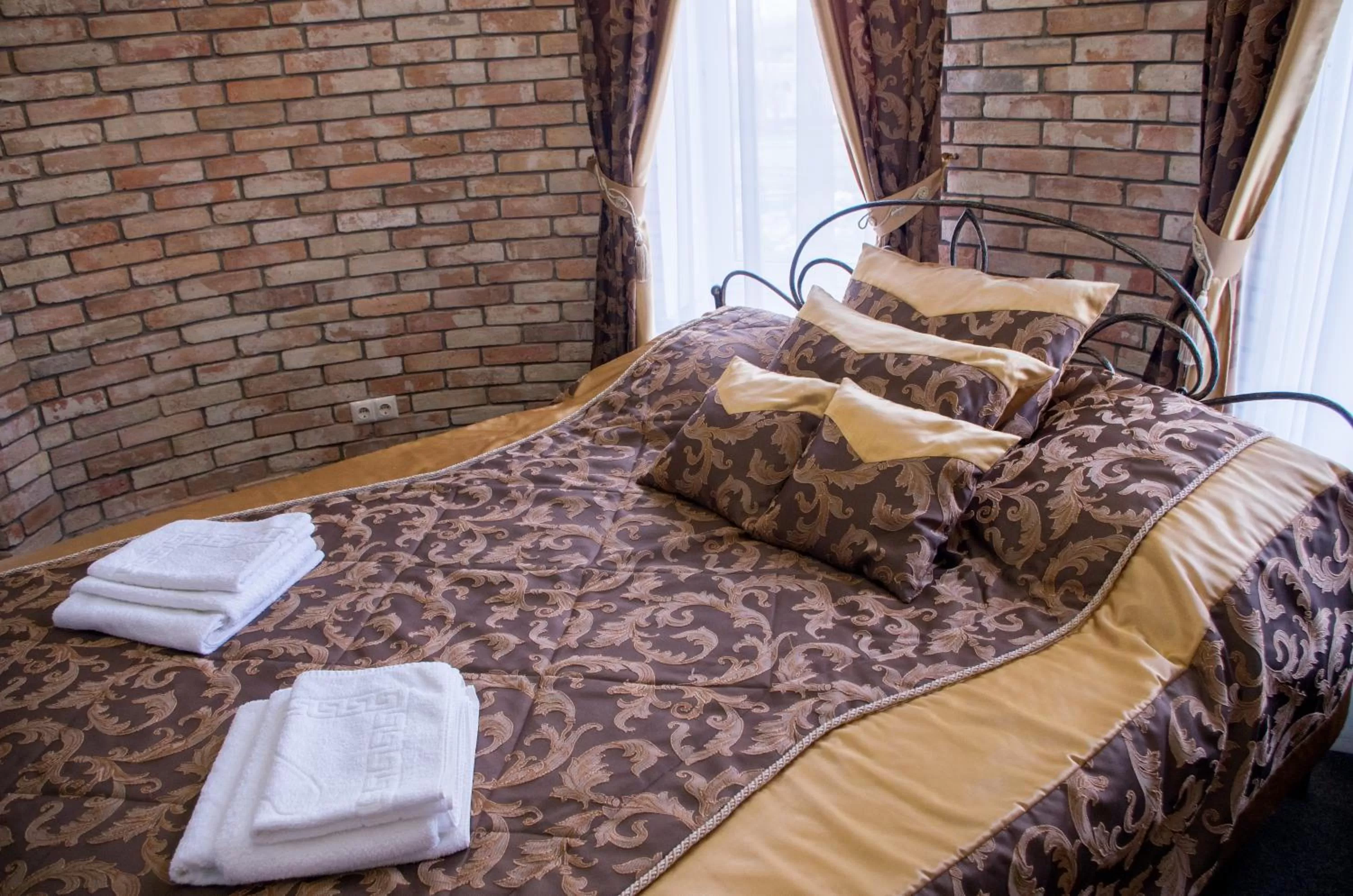 Bed in Ermitazh Hotel Complex