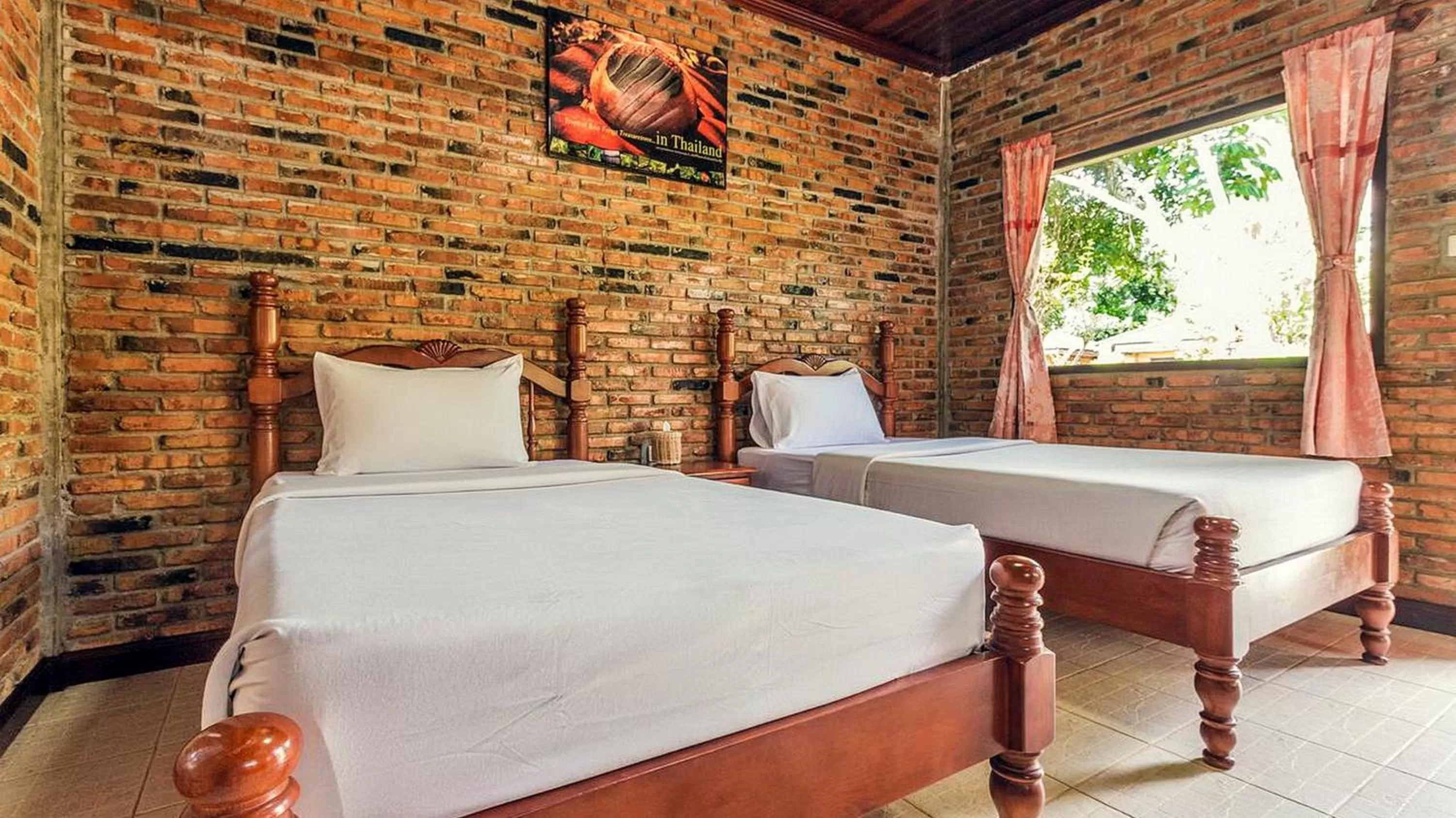 Bed in Doo Dee Boutique Resort by Swiss Chalet