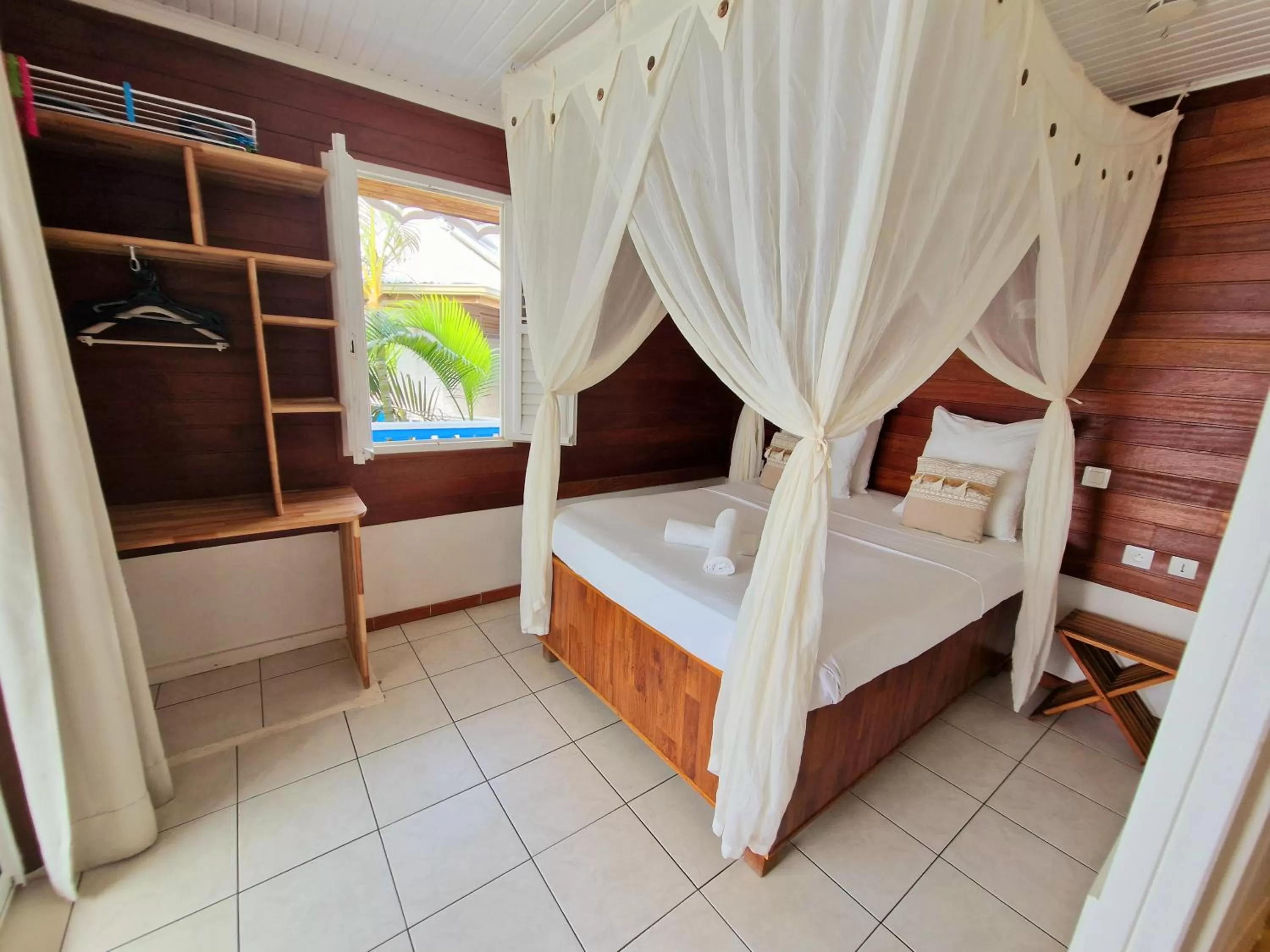 Bed in Hotel Le Manguier