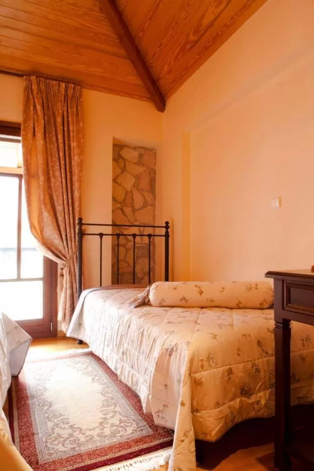 Bed in Hotel Kynaitha