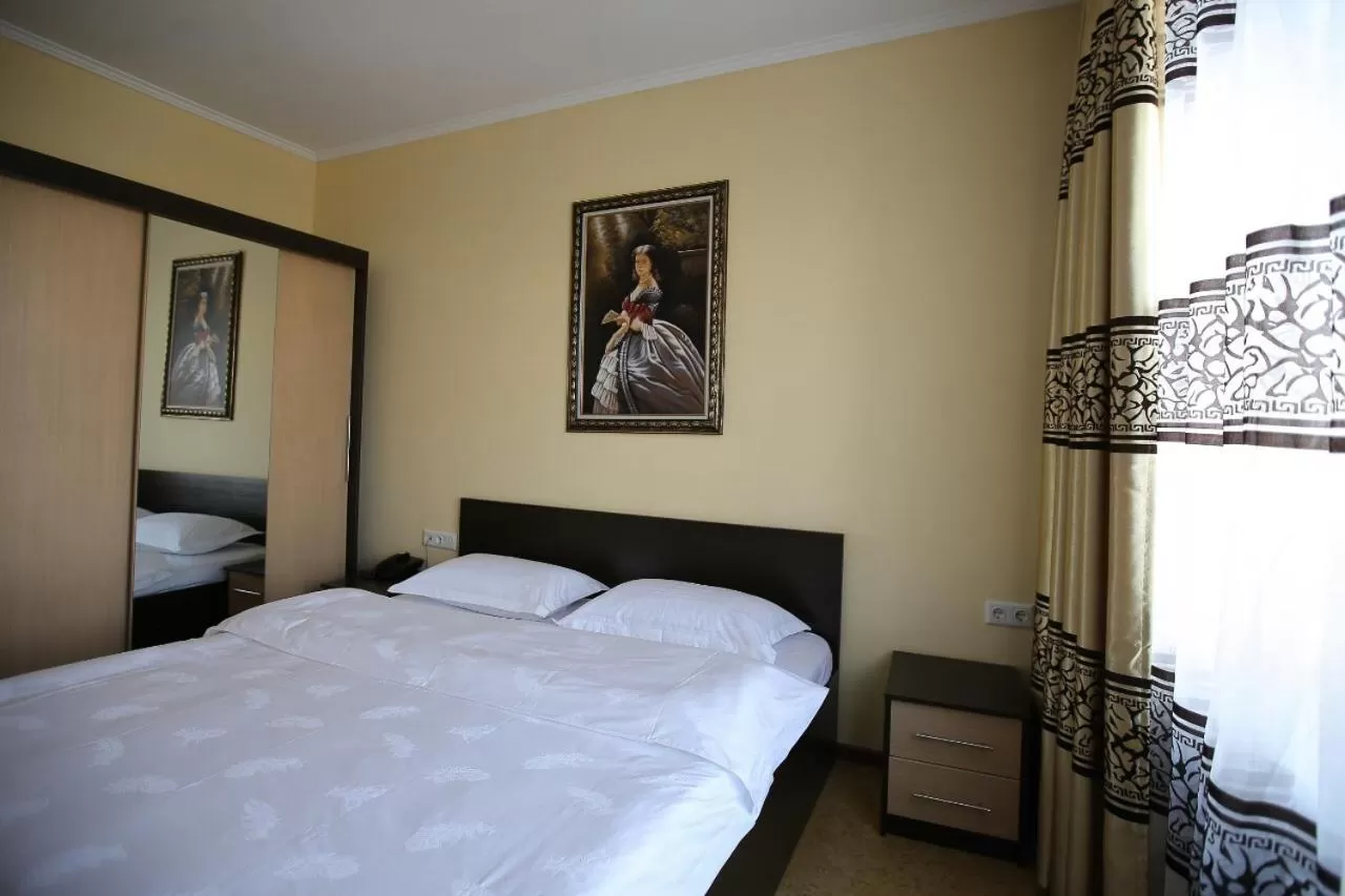 Bed in Altai Business Hotel