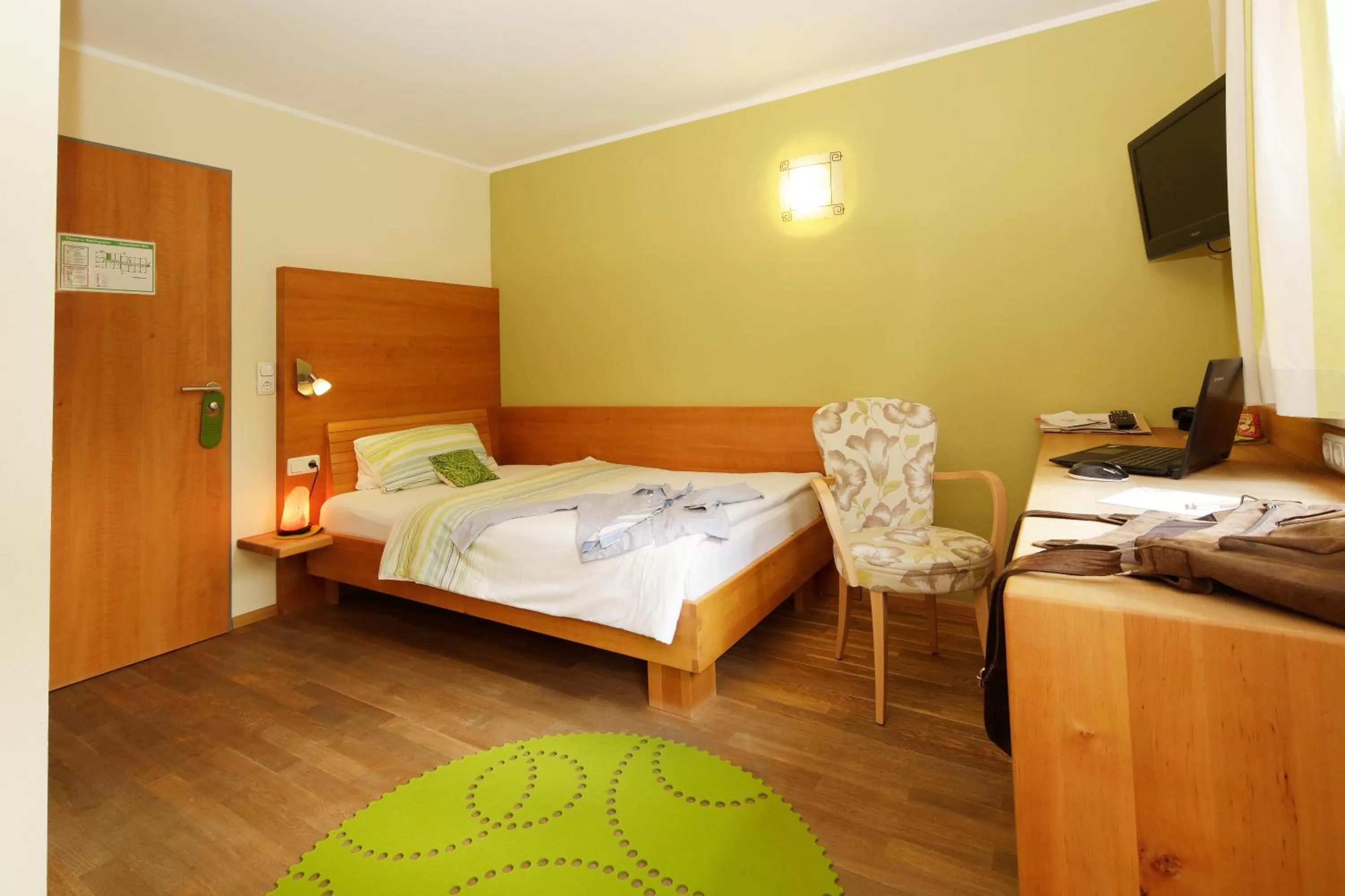 Photo of the whole room, Bed in BIO Hotel Bayerischer Wirt Augsburg