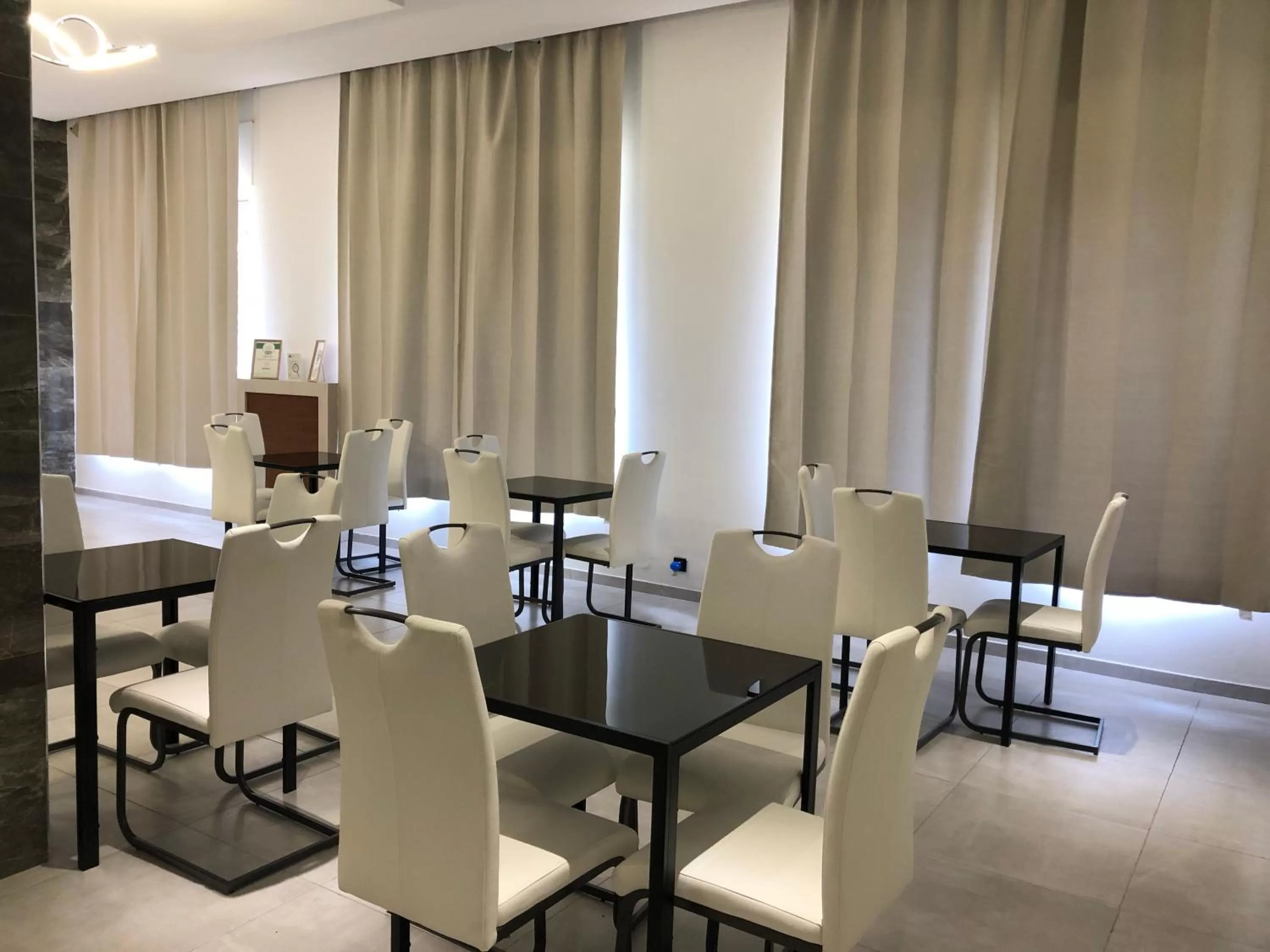 Communal lounge/ TV room in Hotel Frejus