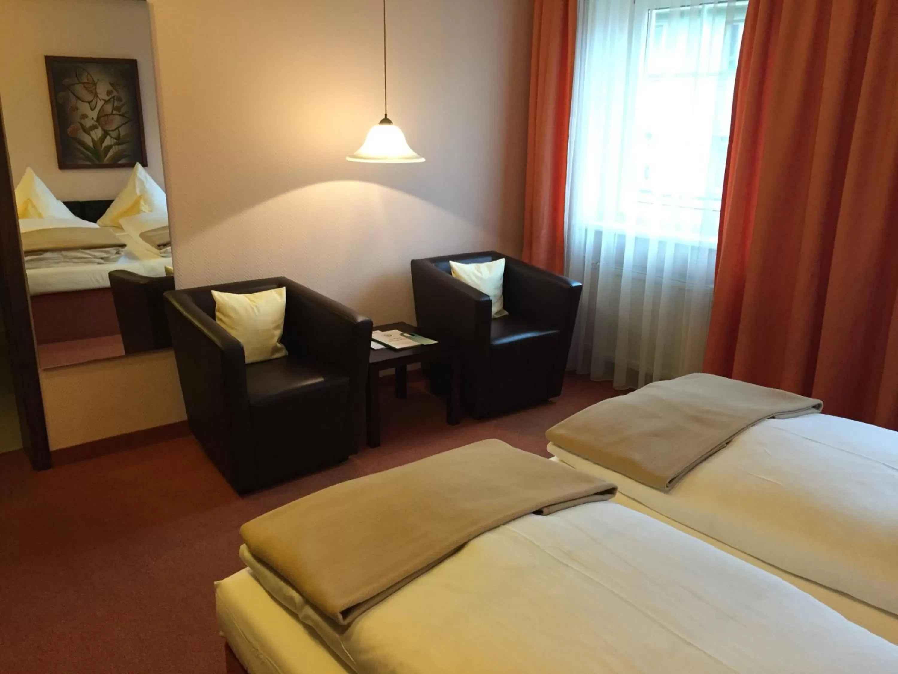 Seating area, Bed in Hotel Goldener Hirsch