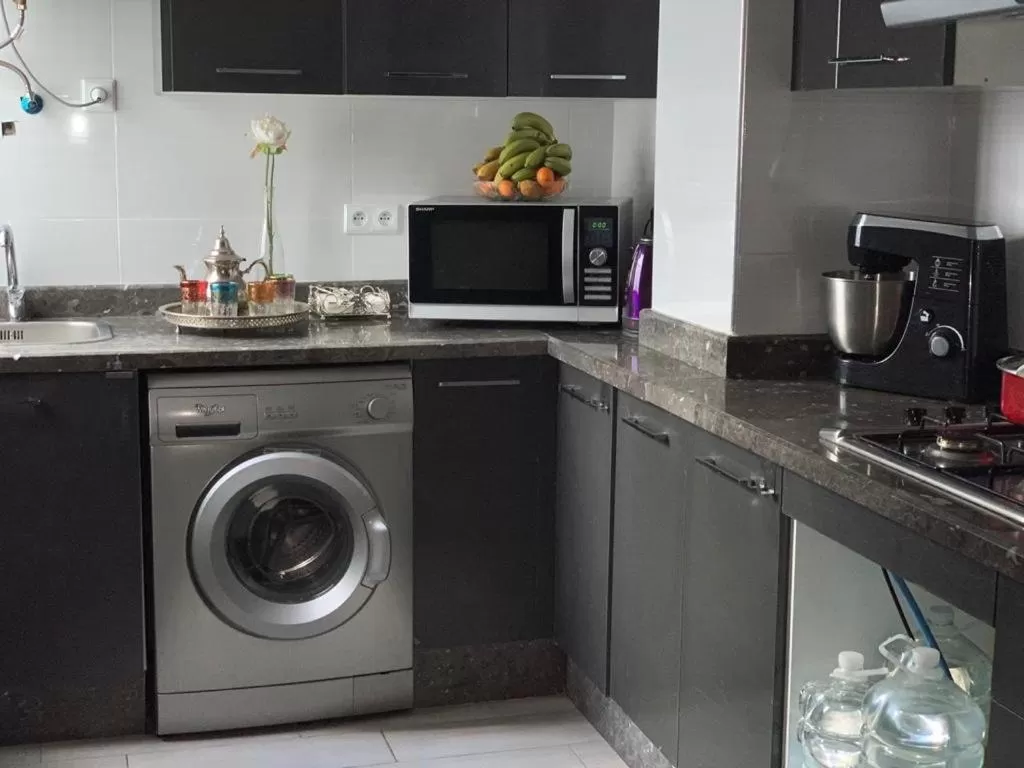 Kitchen/Kitchenette in Appart Hotel Monaco