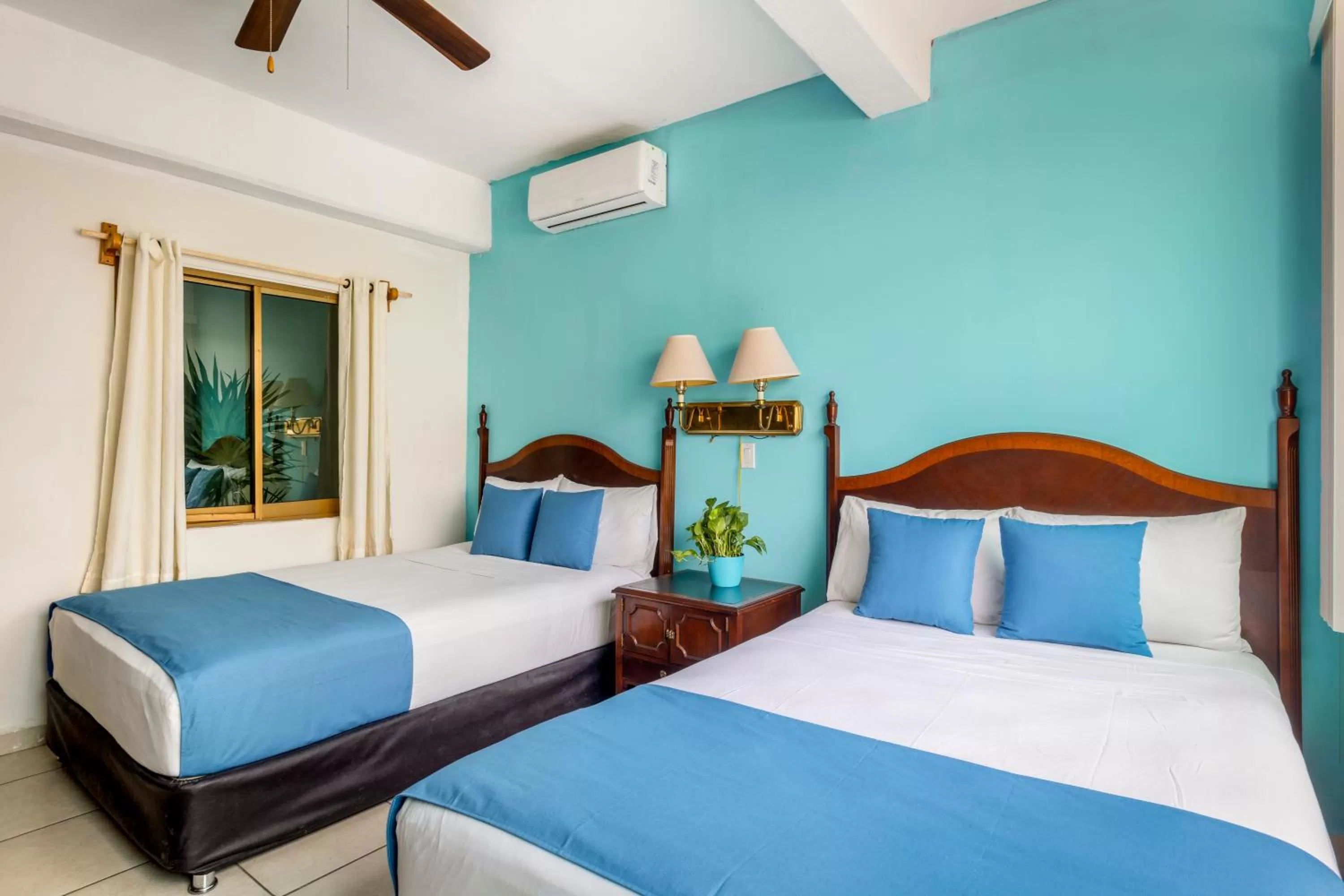 Bed in Hotel Pueblito Vallarta