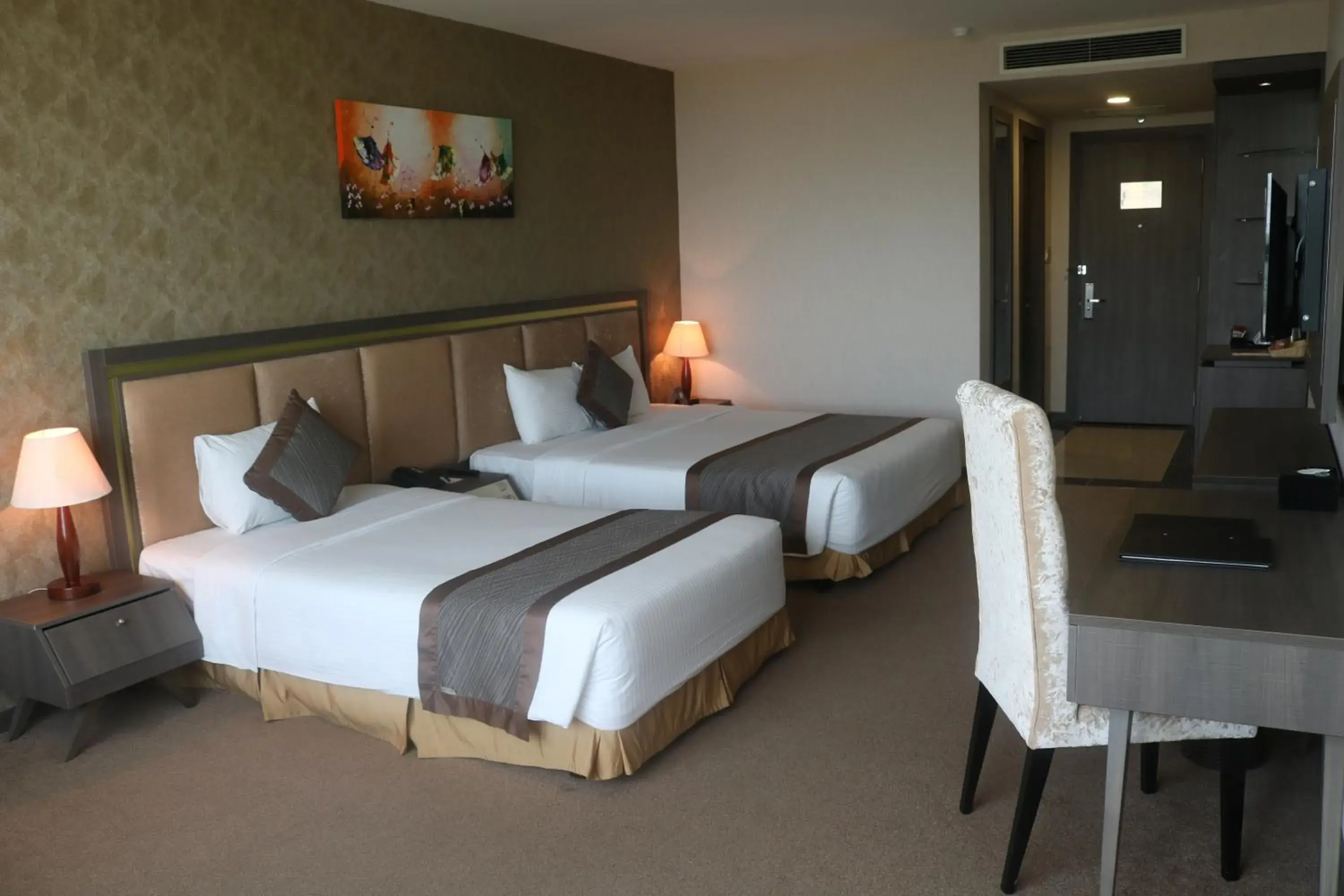 Deluxe Triple Room in Muong Thanh Luxury Can Tho Hotel Deluxe Triple Room in Muong Thanh Luxury Can Tho Hotel