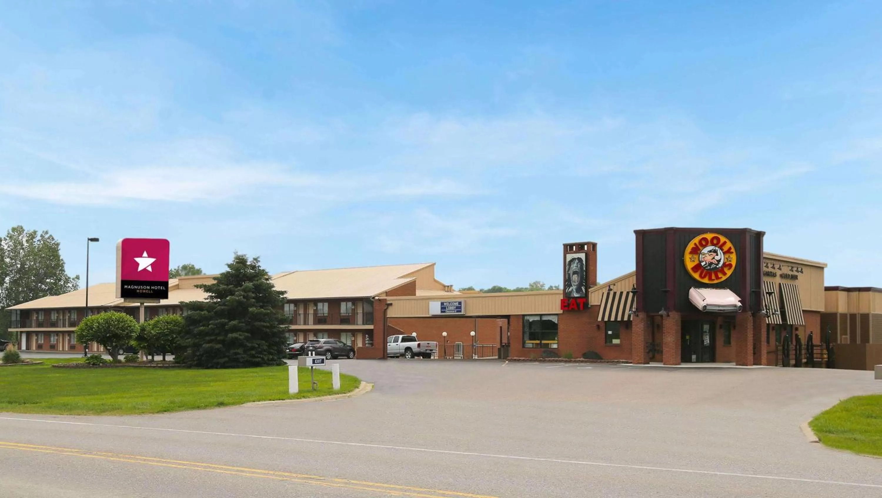 Property building in Magnuson Hotel Howell/Brighton