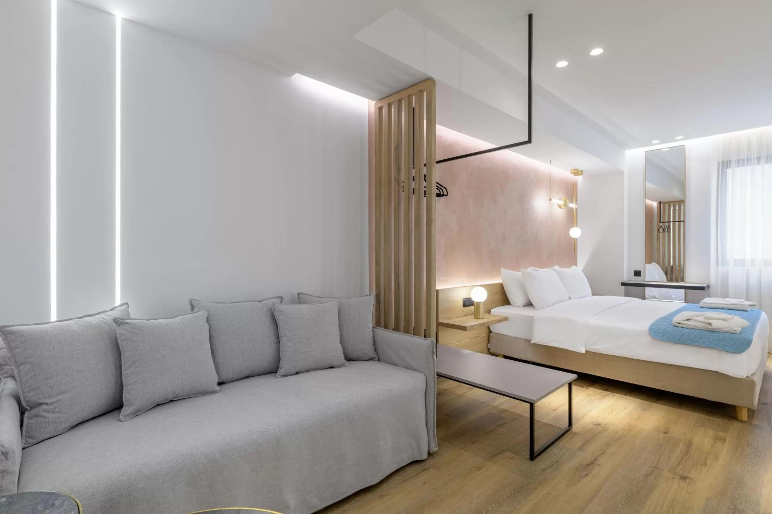 Bed in Acropolis Magenta Luxury Suites