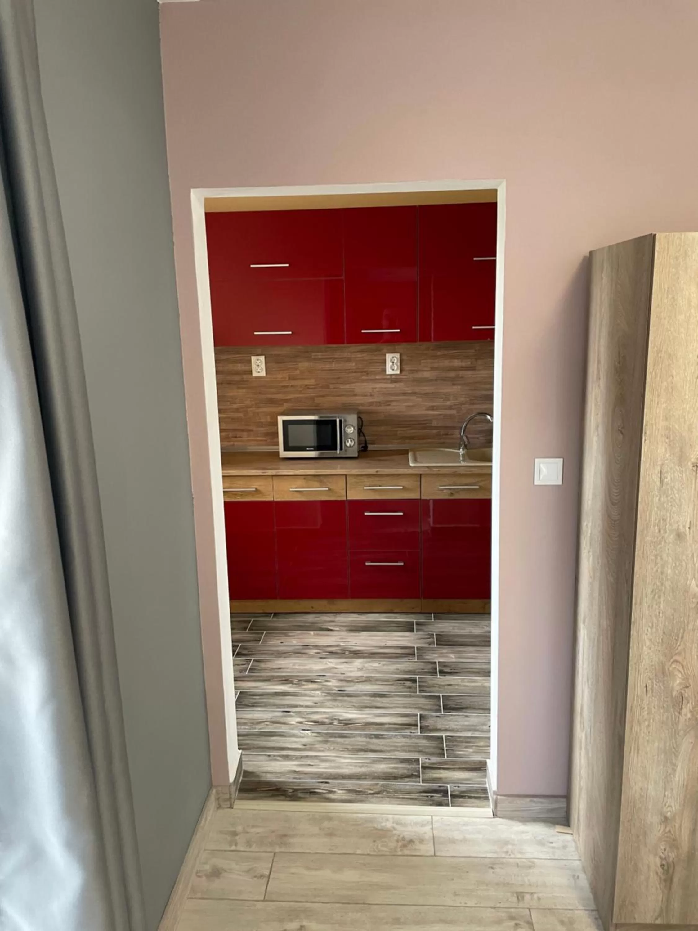 Kitchen/Kitchenette in Family Hotel Malibu