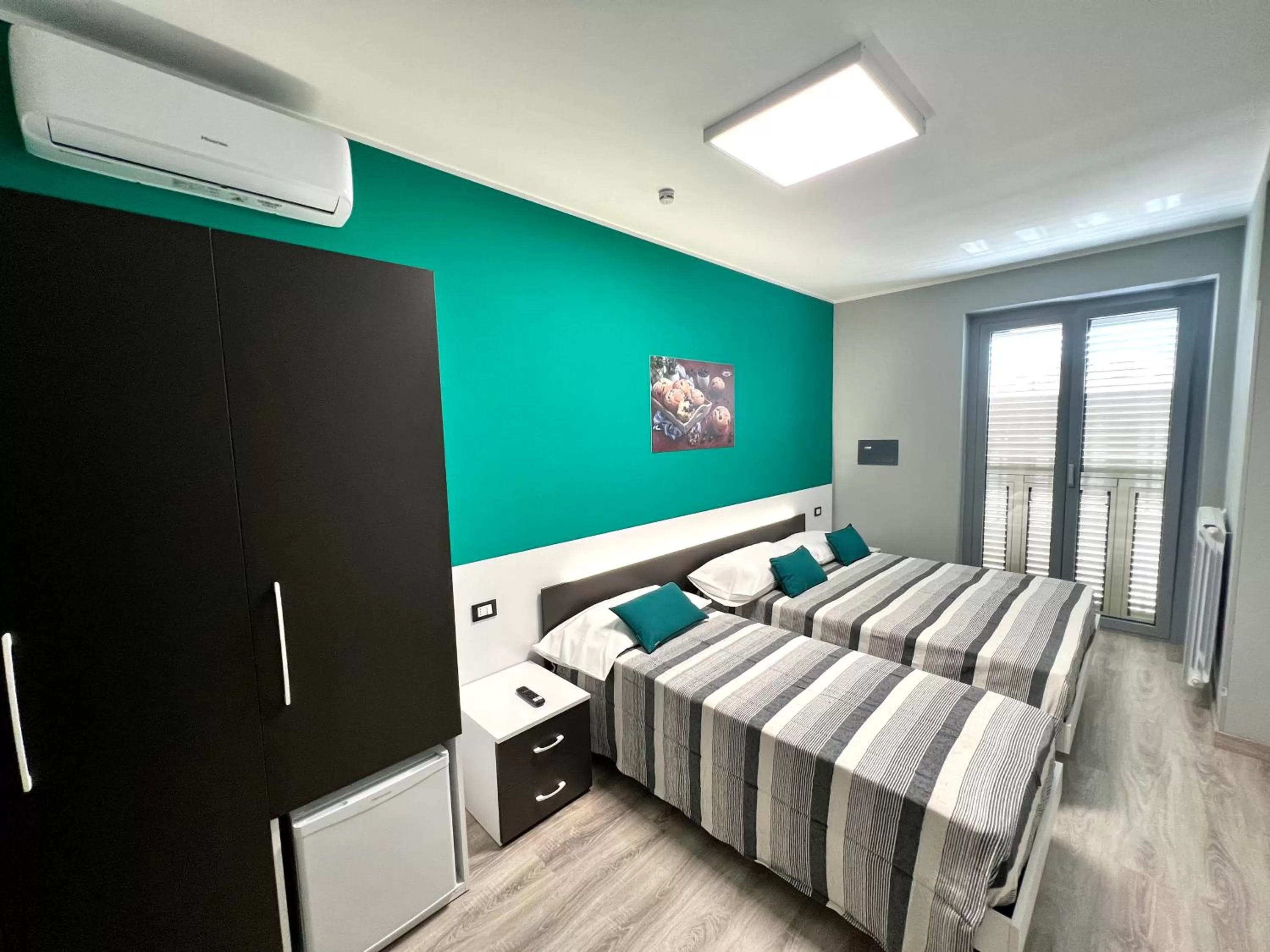 Bed in Siclari B&B-Rooms&Suite